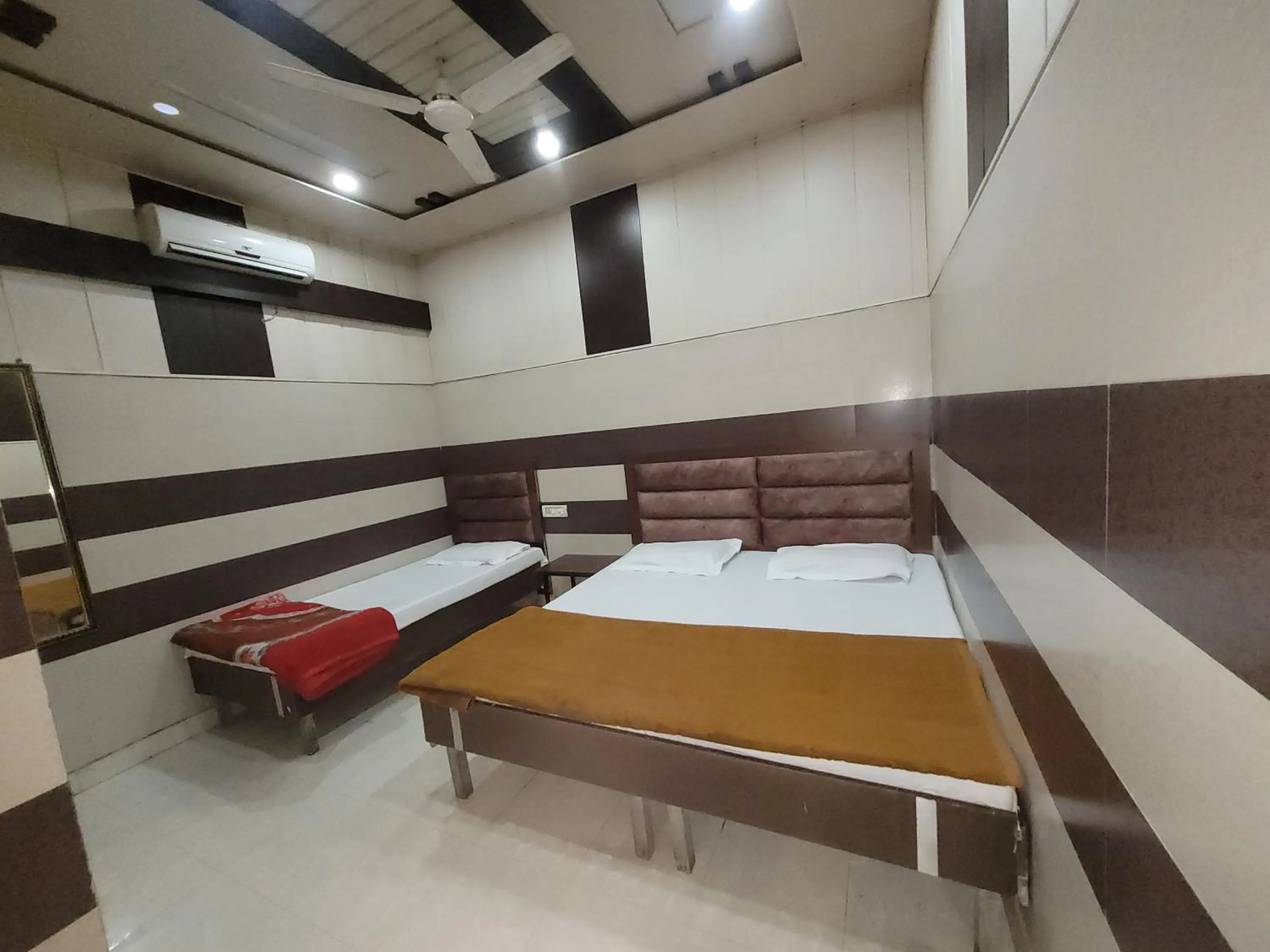 Bed in Asha Guest House