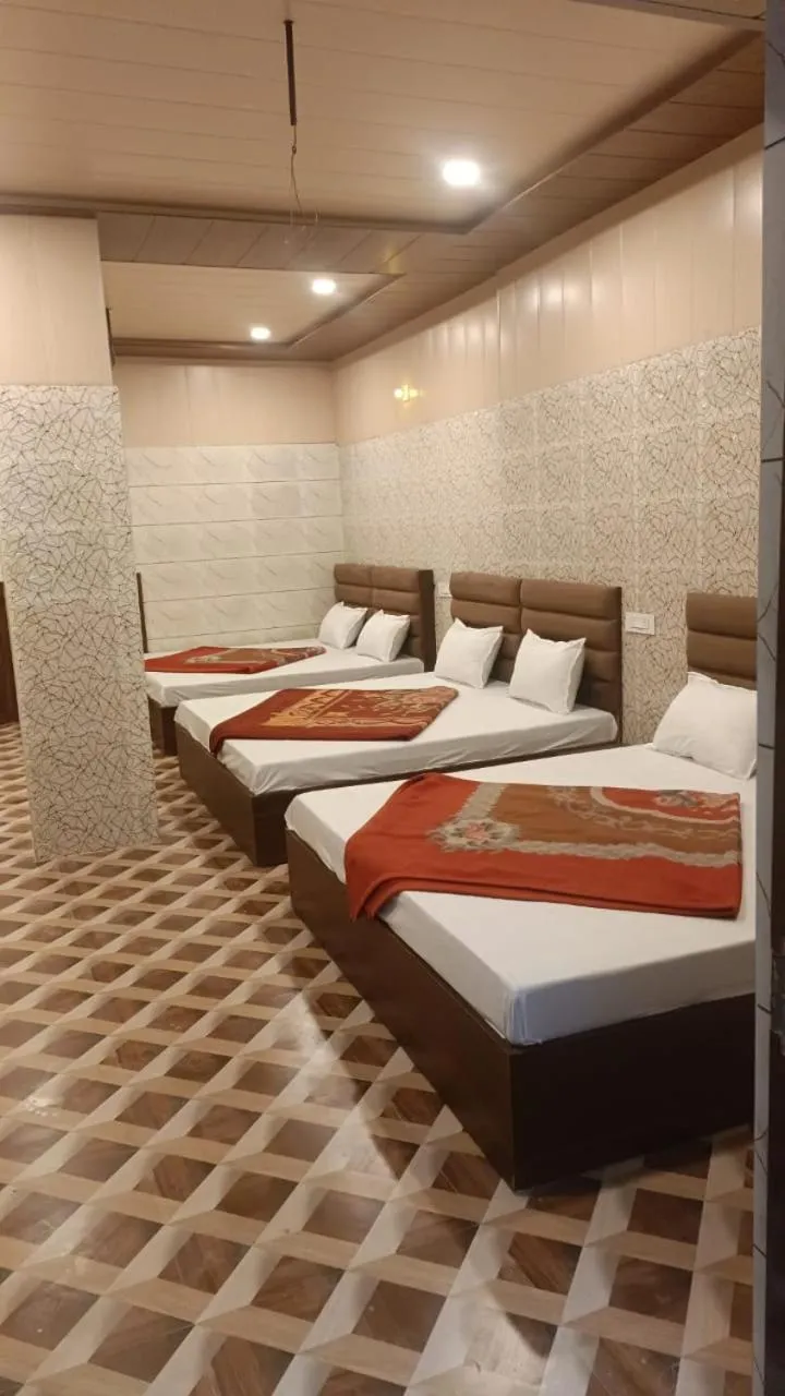 Bed in Asha Guest House