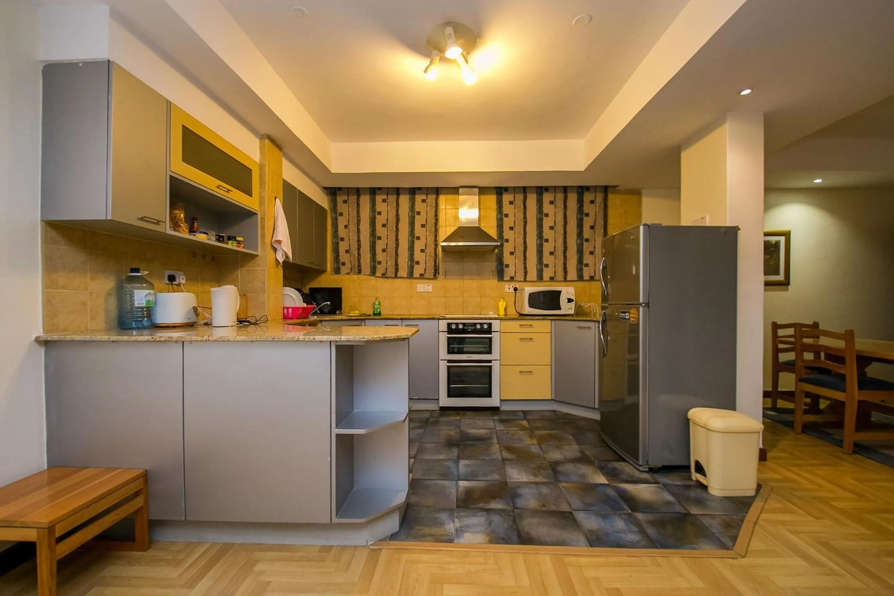 Kitchen or kitchenette in Kates Apartments