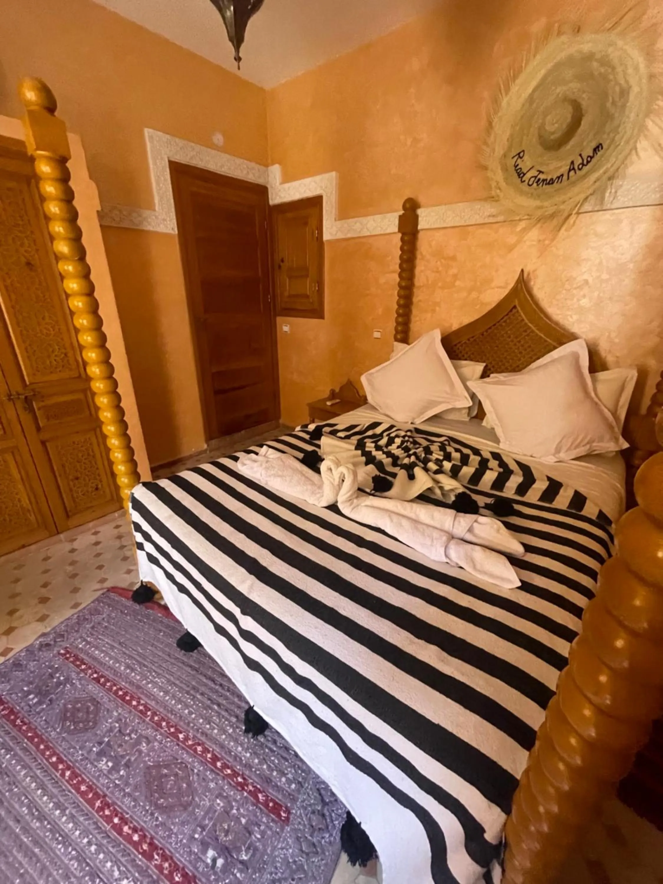 Bed in Riad Jenan Adam