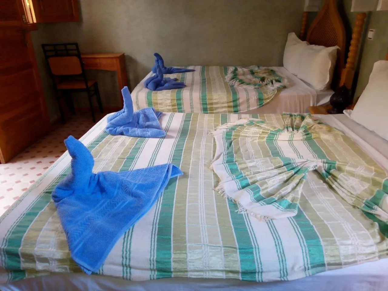 Bed in Riad Jenan Adam