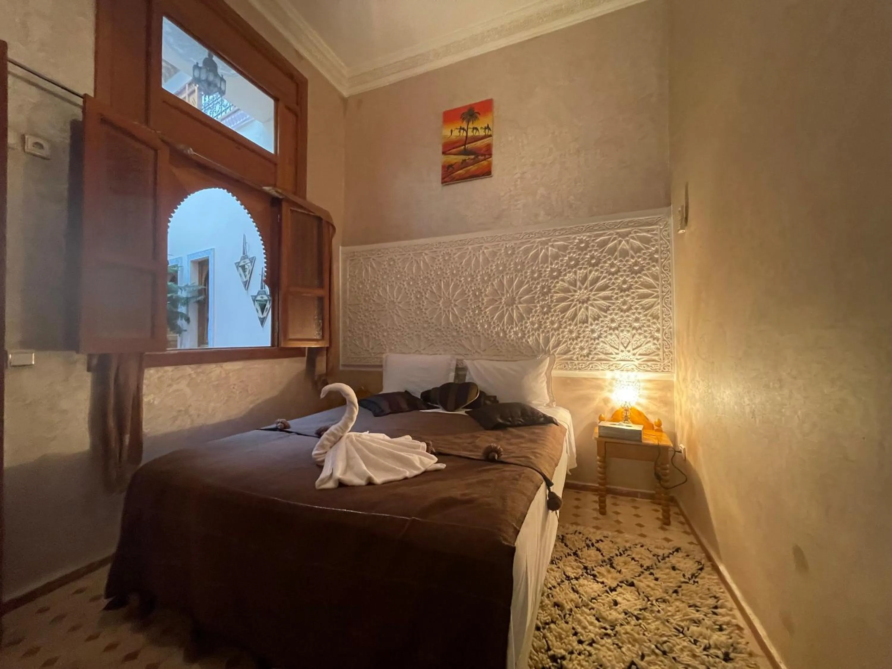 Bed in Riad Jenan Adam