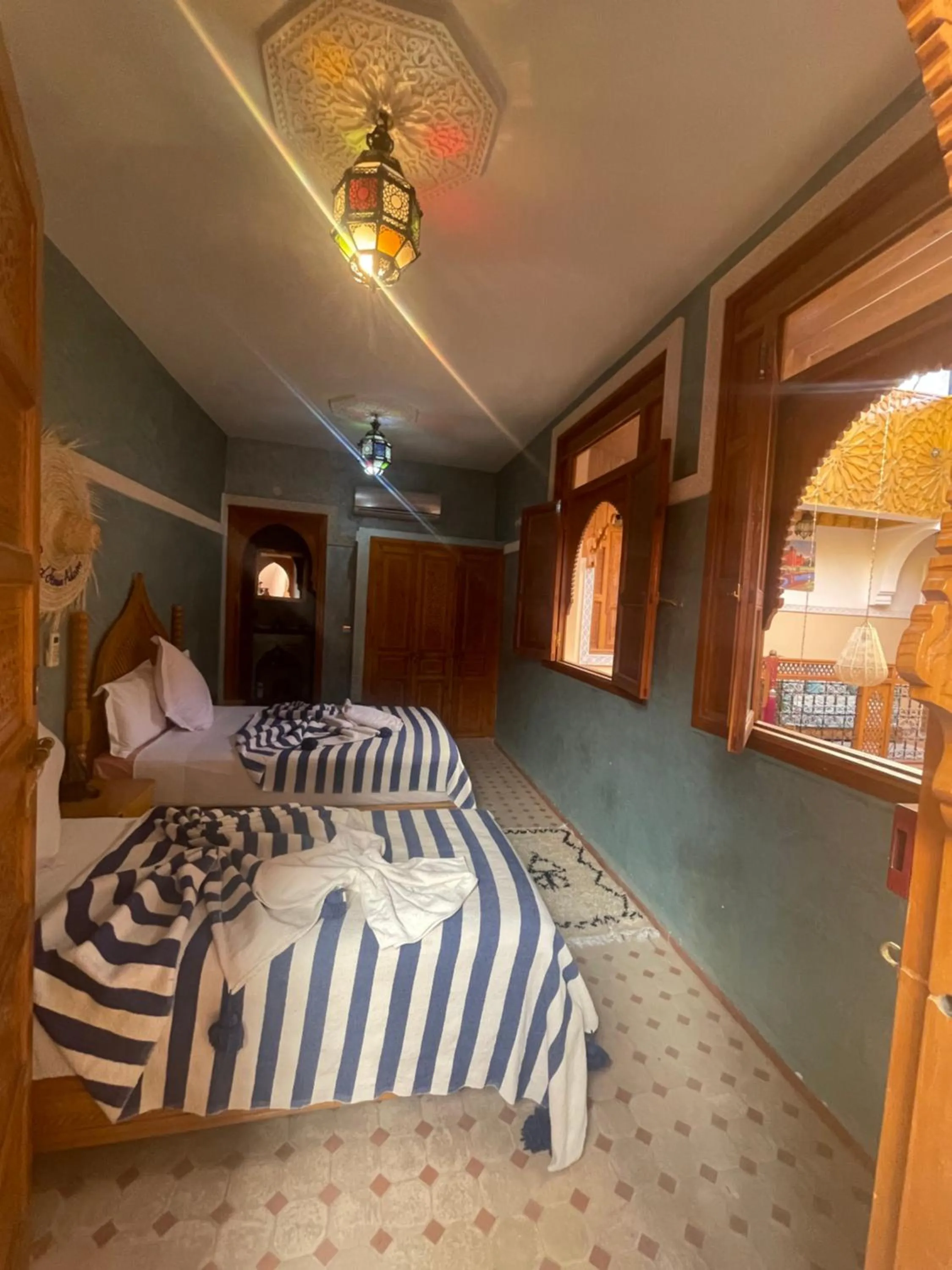 Bed in Riad Jenan Adam