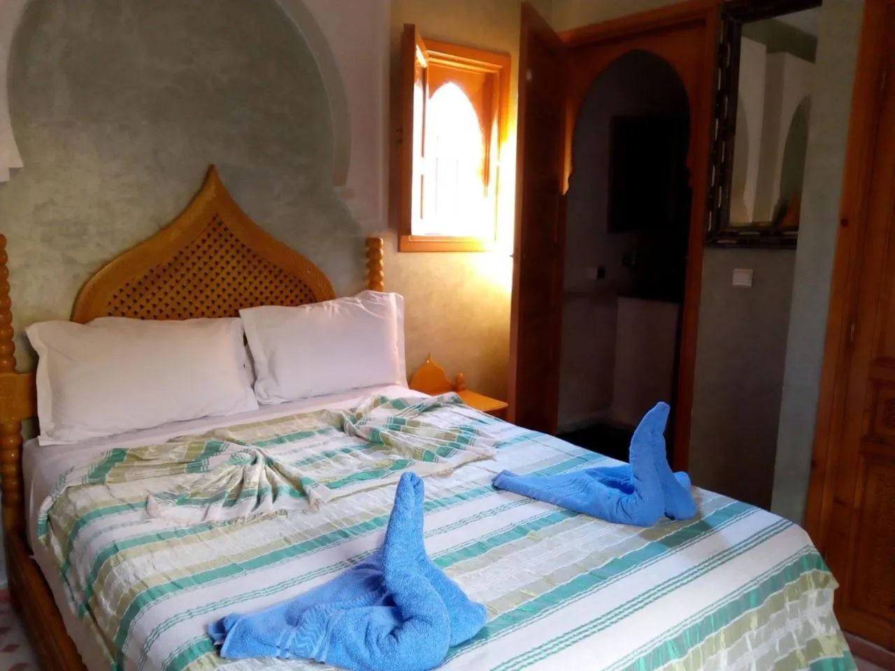 Bed in Riad Jenan Adam