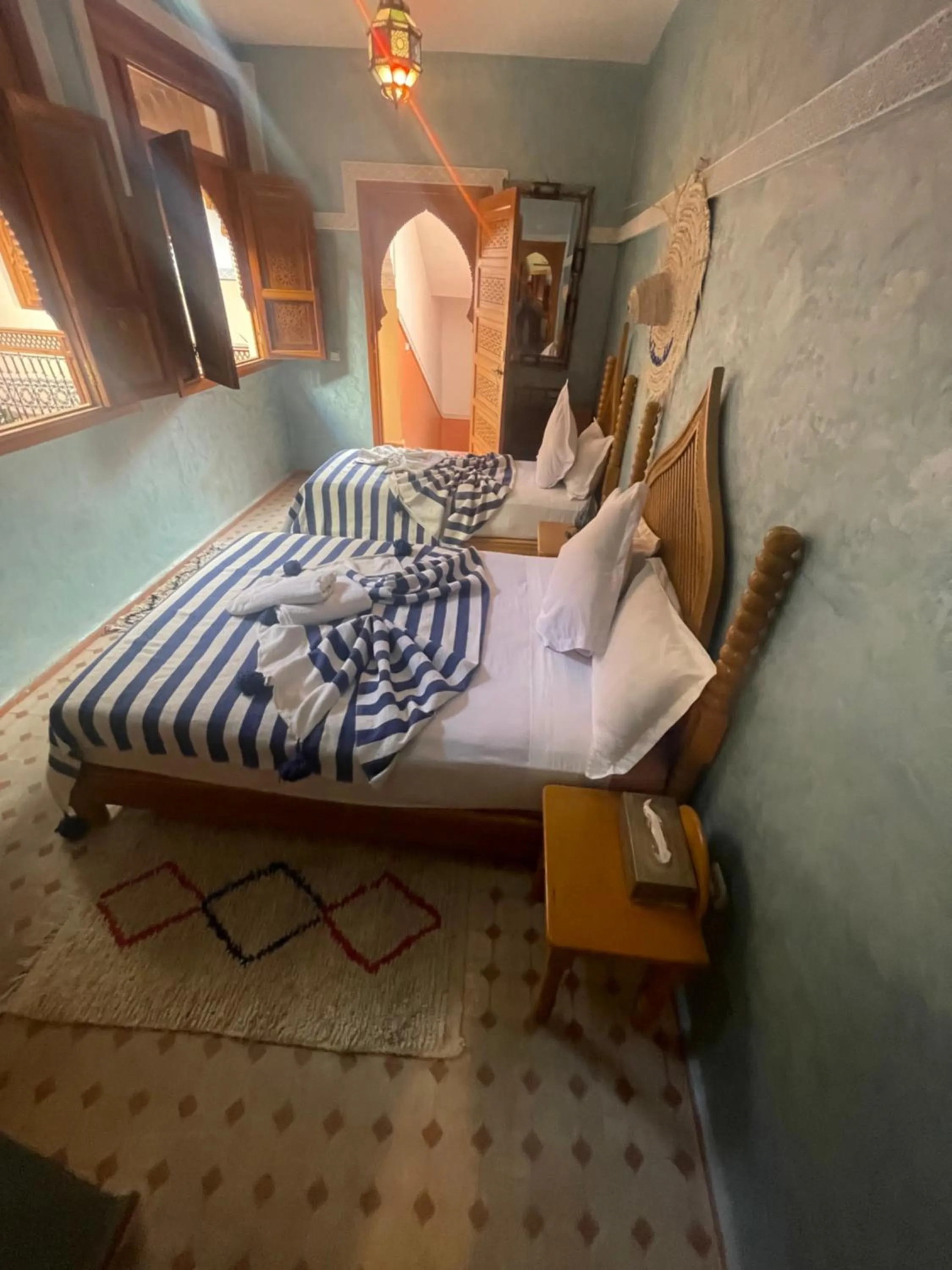 Bed in Riad Jenan Adam