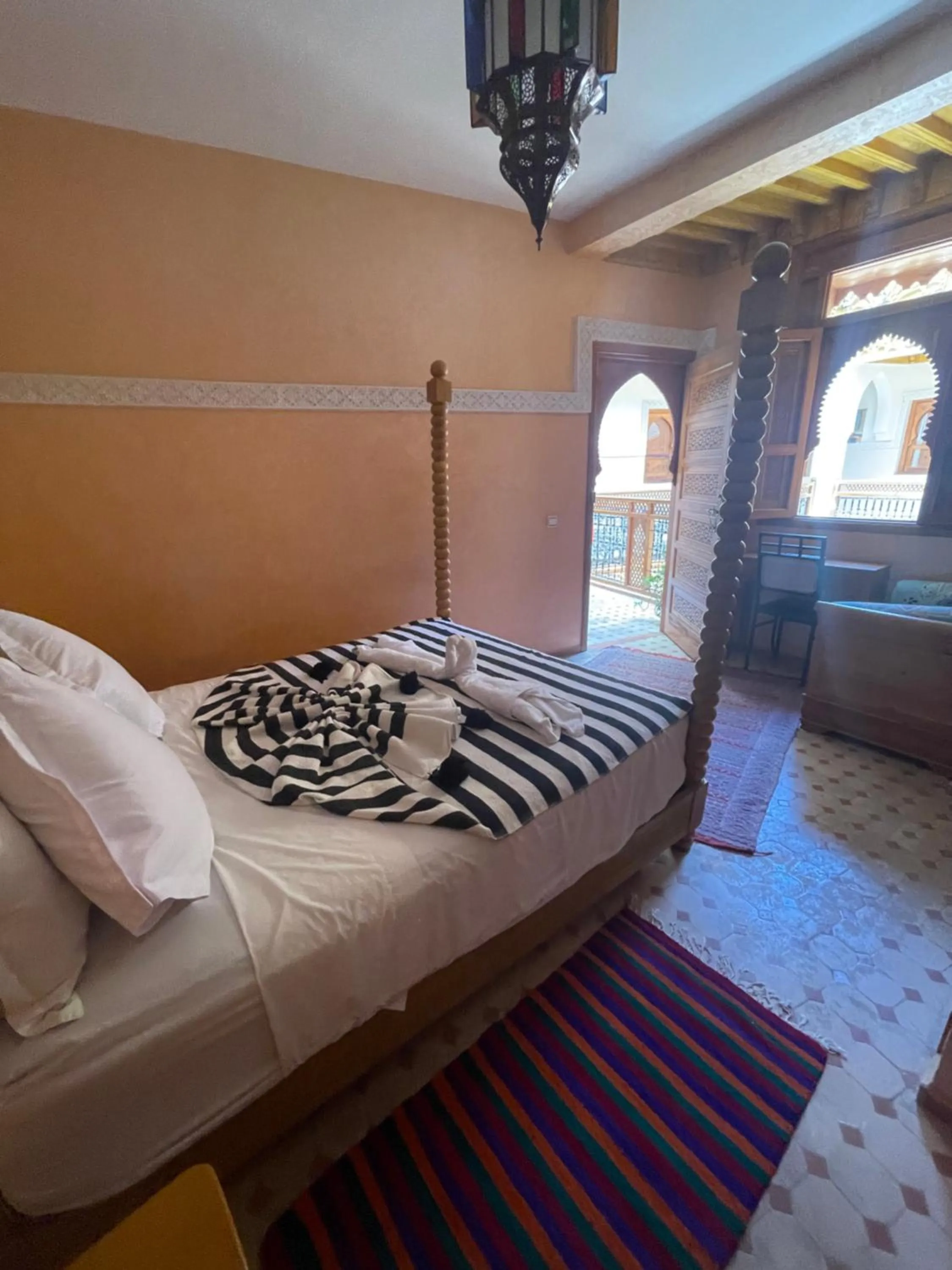 Bed in Riad Jenan Adam