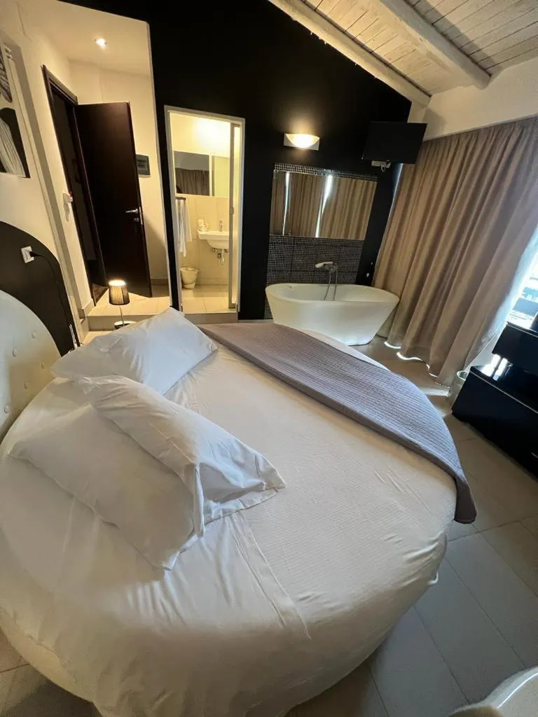 Bed in Michelangelo Etna Hotel