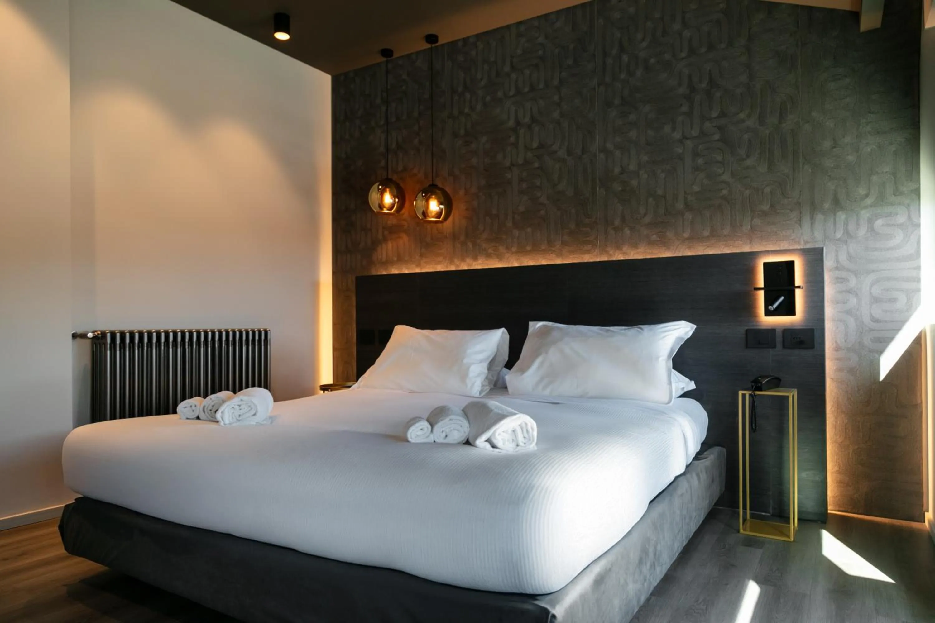 Bed in Michelangelo Etna Hotel