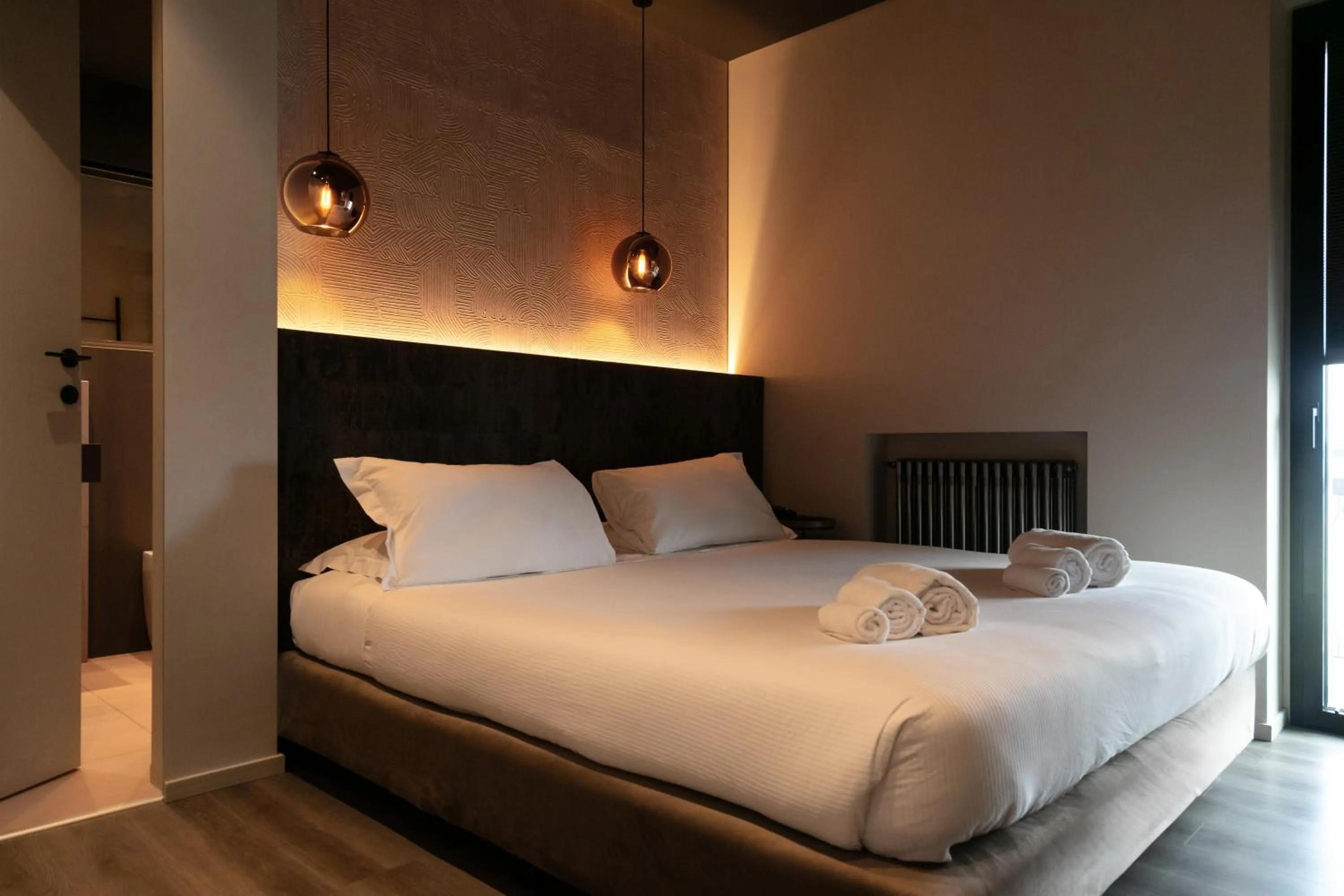 Bed in Michelangelo Etna Hotel