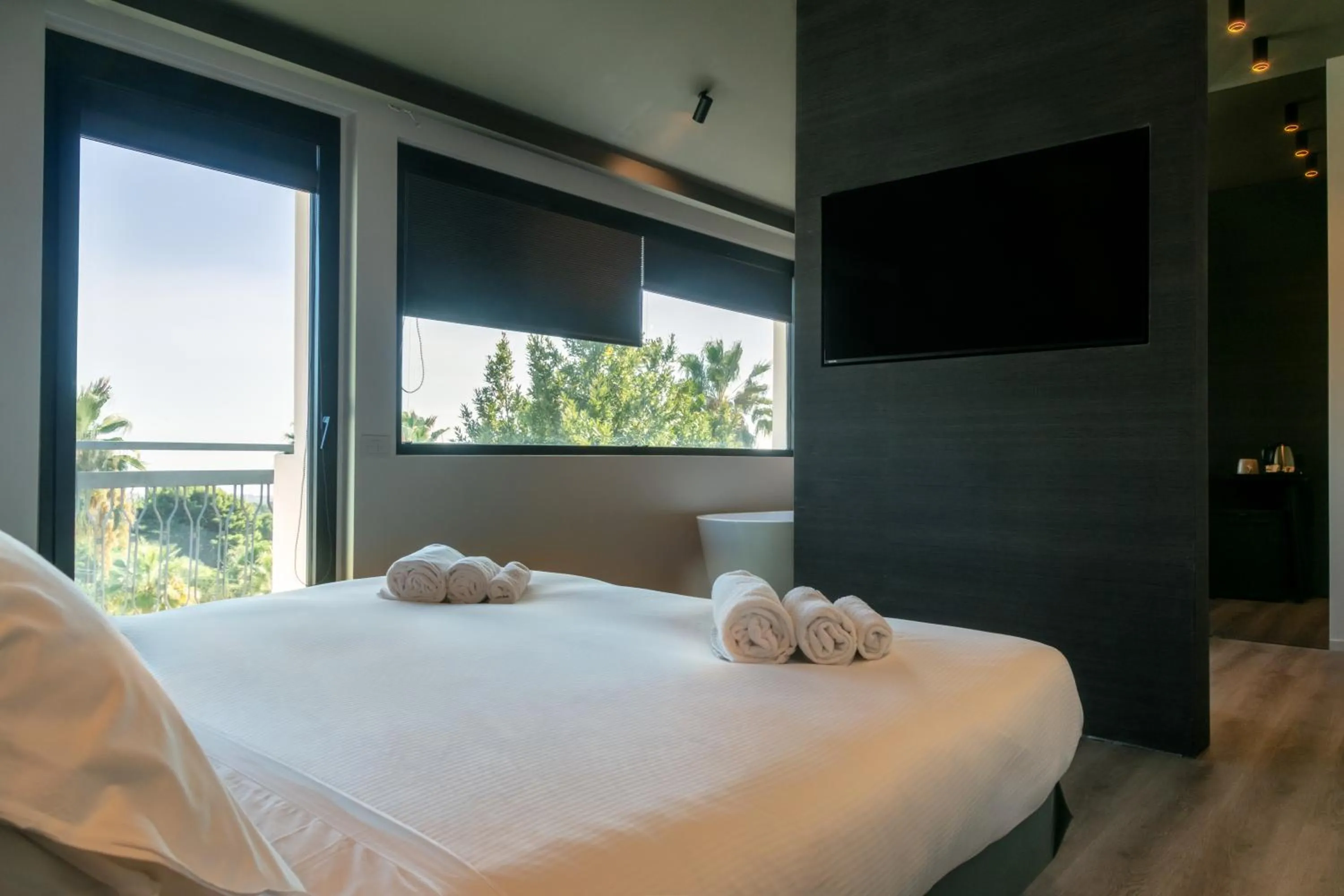 Bed in Michelangelo Etna Hotel