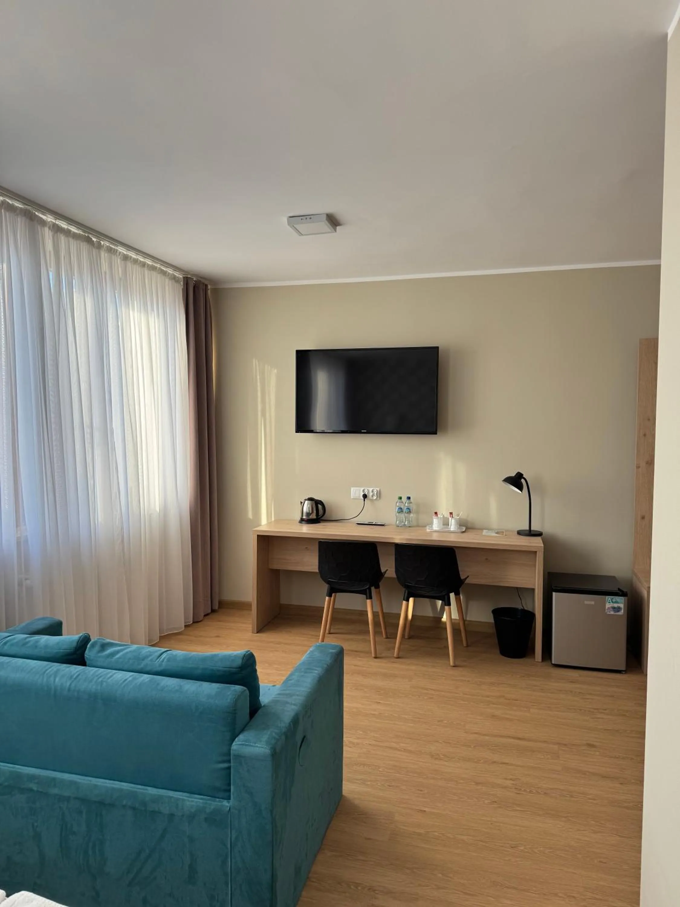 Seating area in Carina Hotel