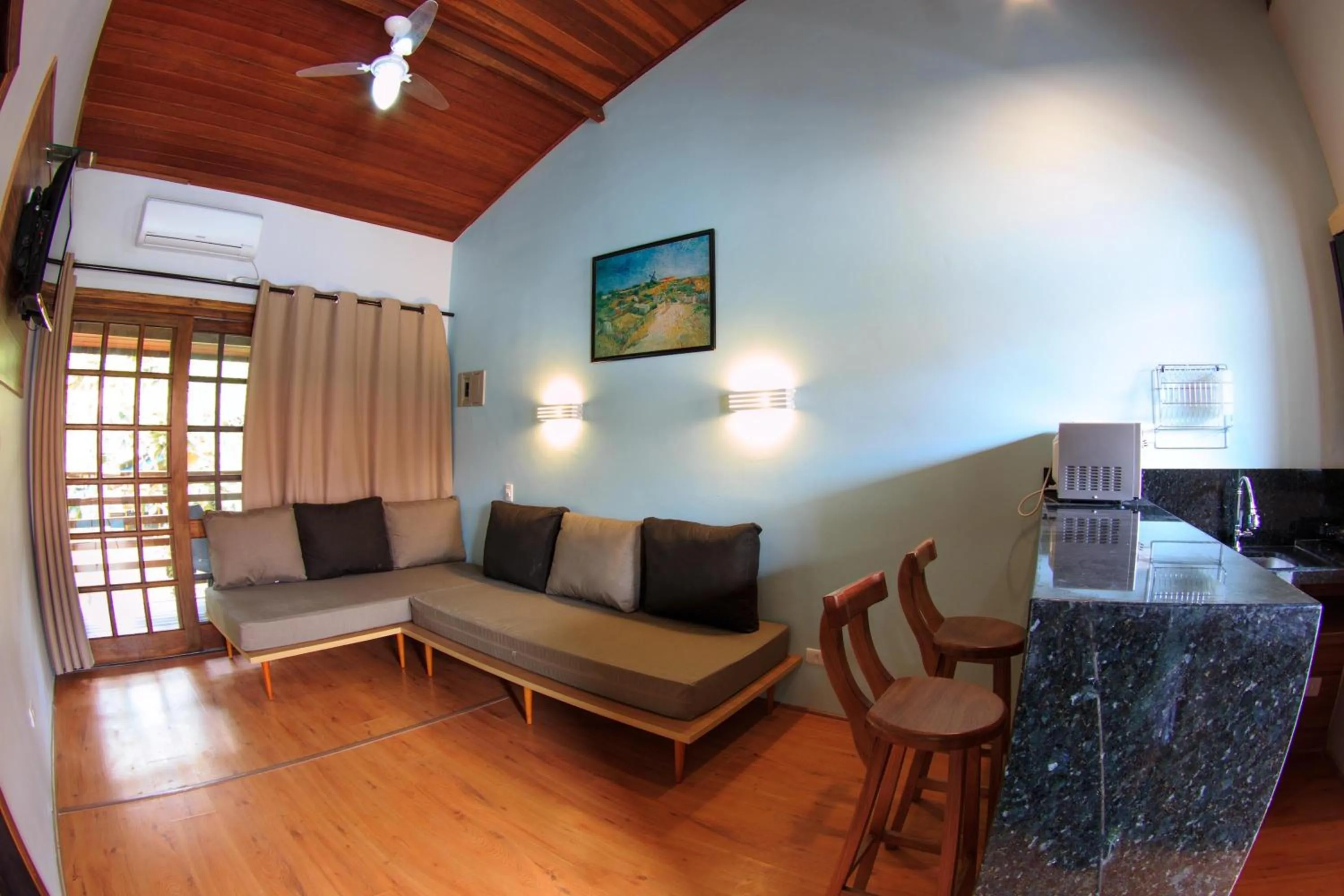 Living room in Flat Vila Morena a pousada da sua família