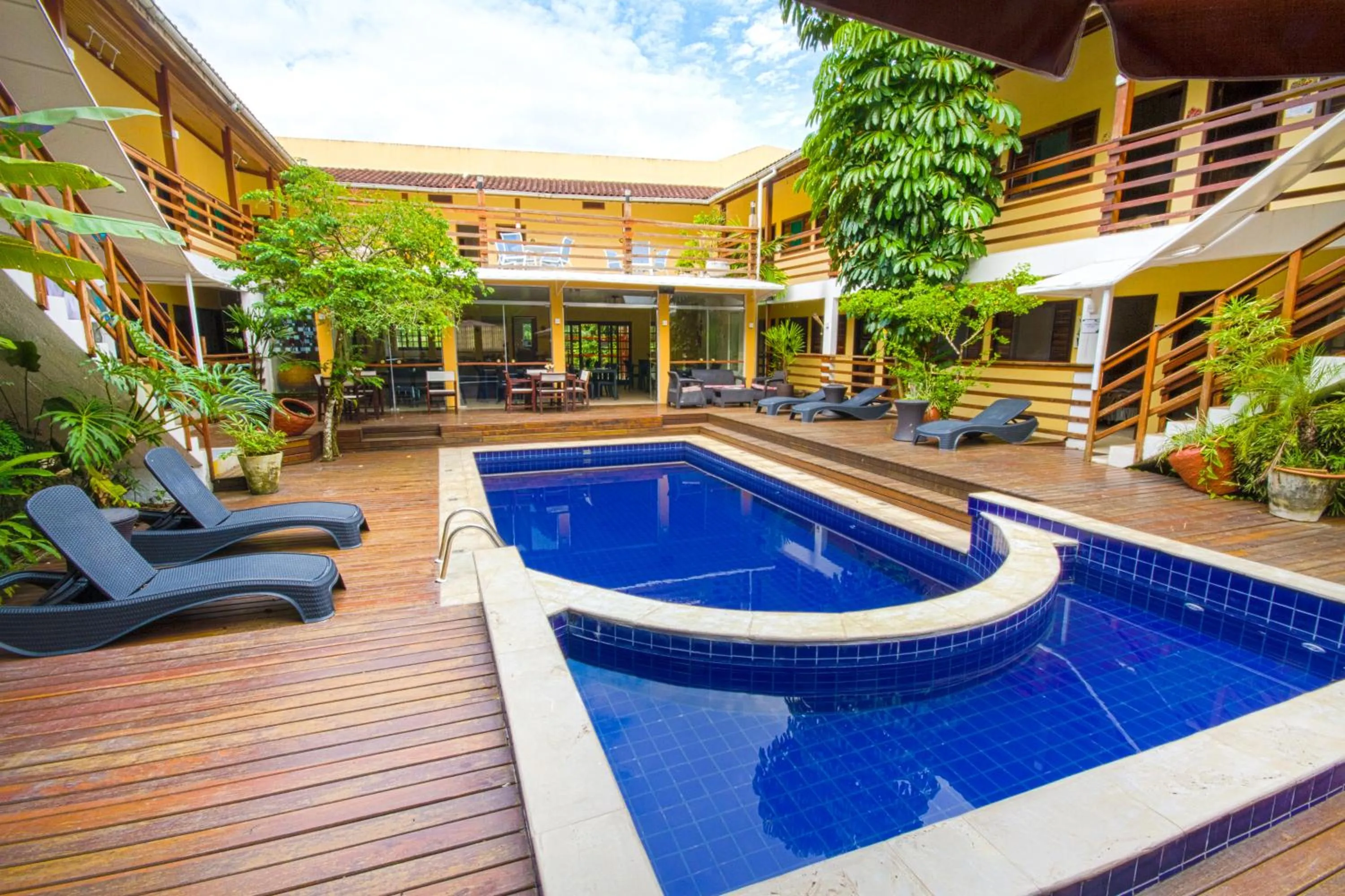 Swimming pool in Flat Vila Morena a pousada da sua família