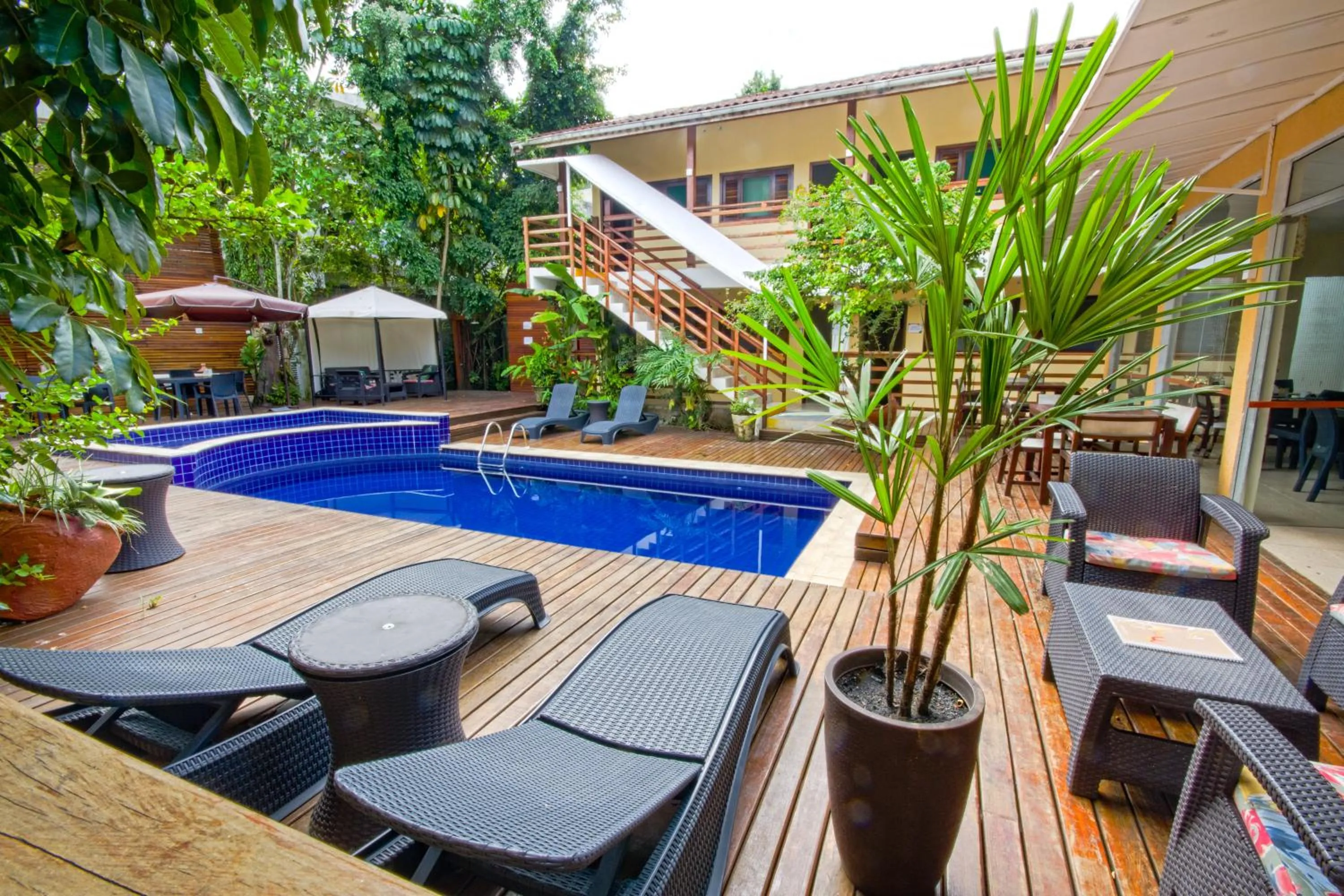 Swimming pool in Flat Vila Morena a pousada da sua família