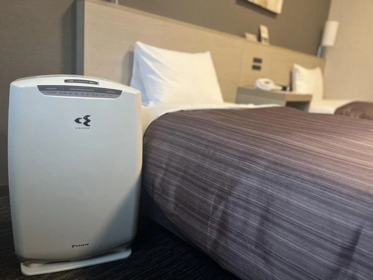 Bed in Hotel Route Inn Grand Asahikawa Ekimae