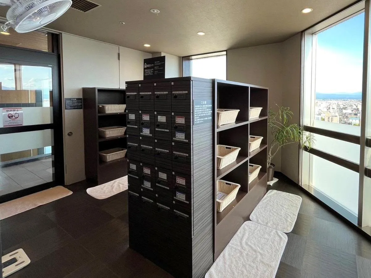 Bed in Hotel Route Inn Grand Asahikawa Ekimae