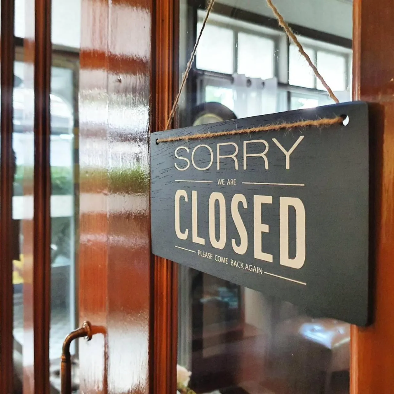 Property logo or sign in Dinsomon Hotel