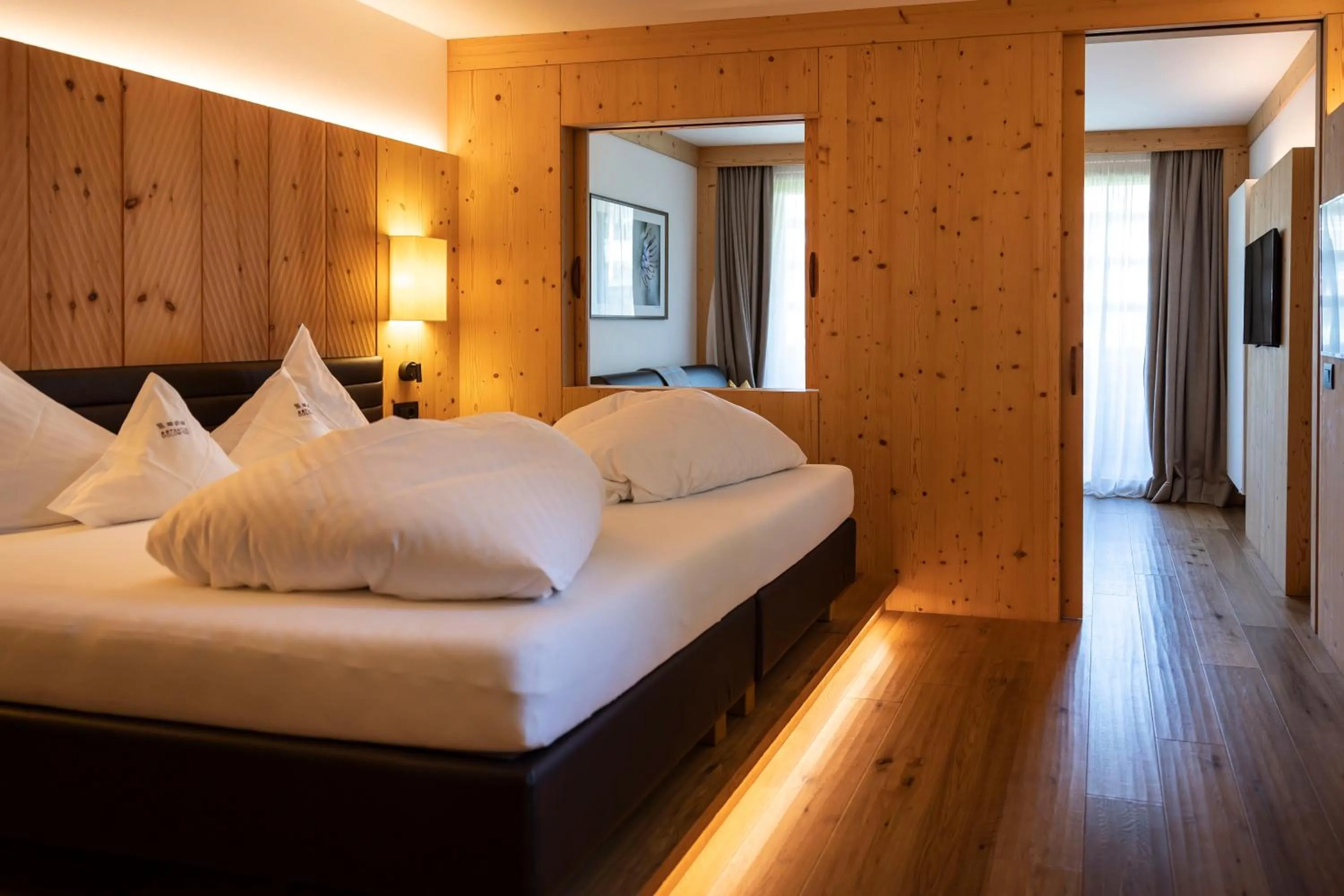 Bedroom, Bed in Artnatur Dolomites Hotel & Spa