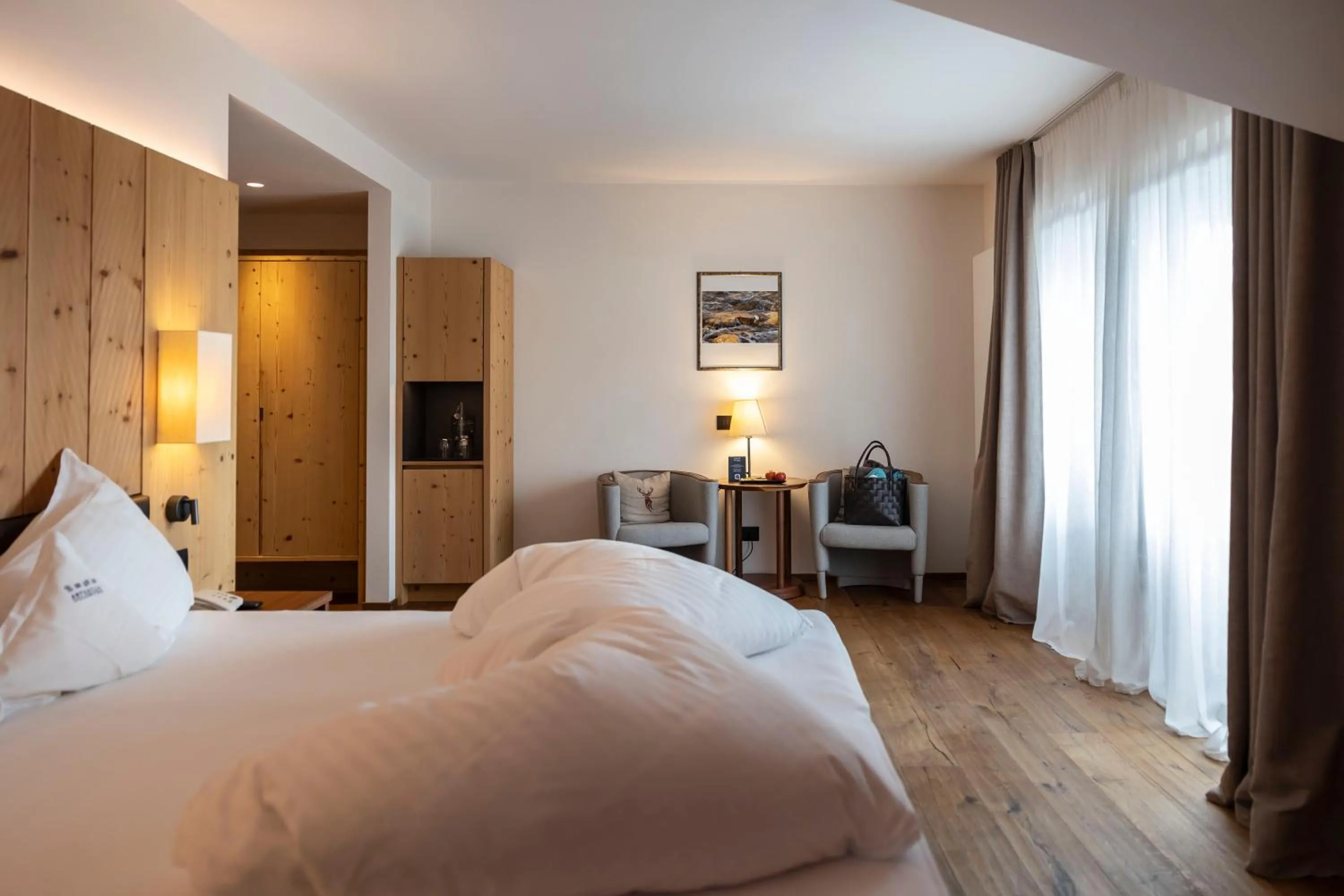 Bedroom, Bed in Artnatur Dolomites Hotel & Spa