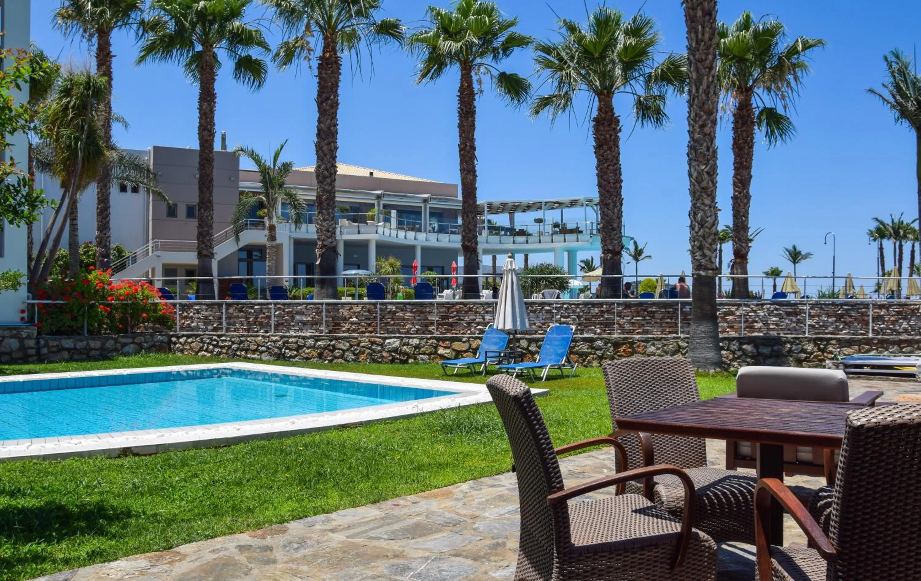 Patio, Swimming Pool in Royal Heights Resort Villas & Spa