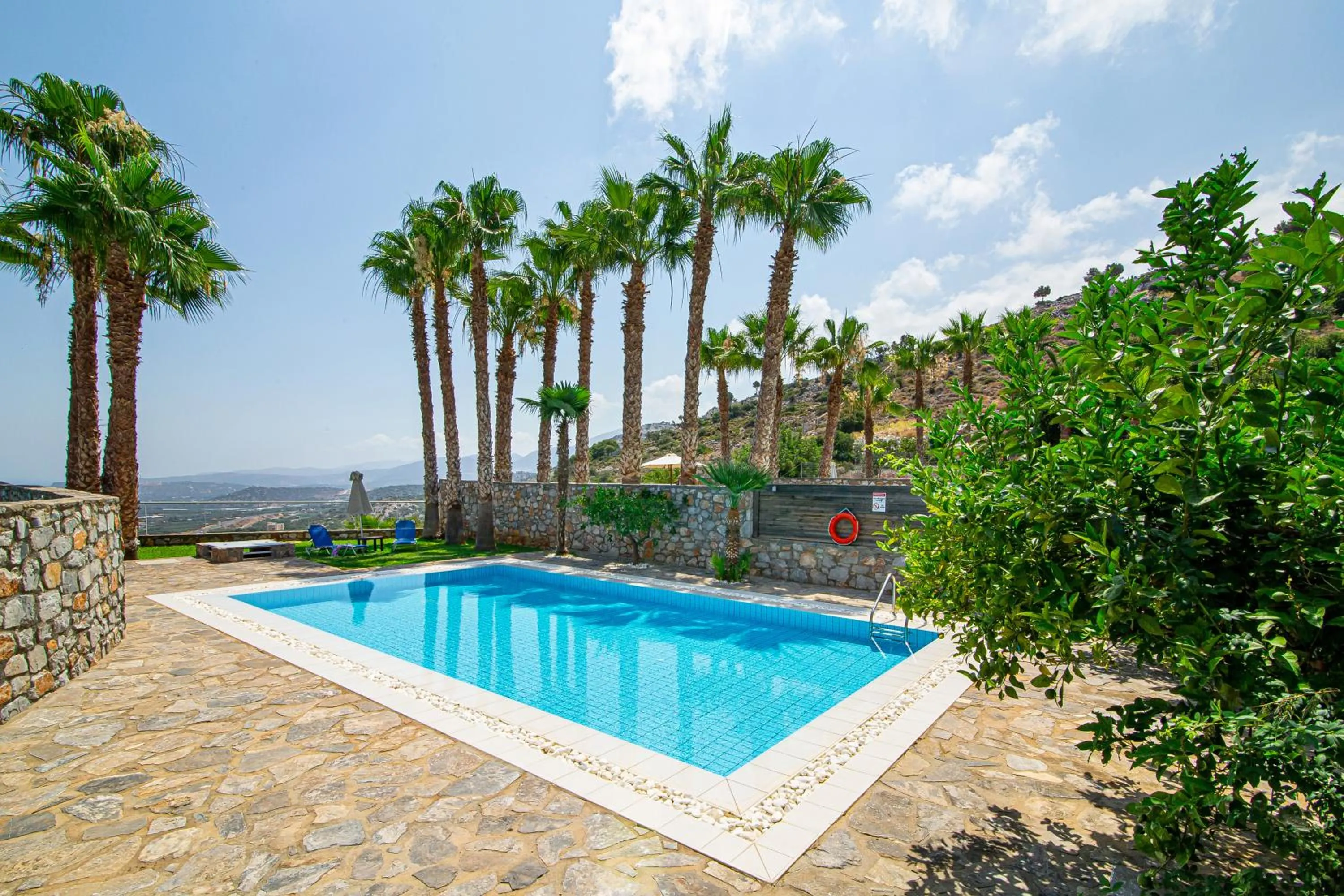 Patio, Swimming Pool in Royal Heights Resort Villas & Spa