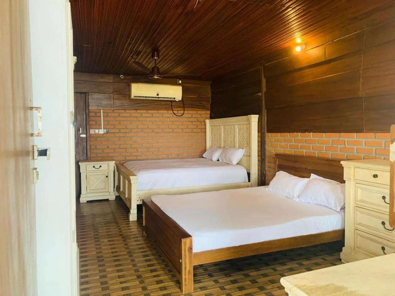 Bed in Shim Beach Resort