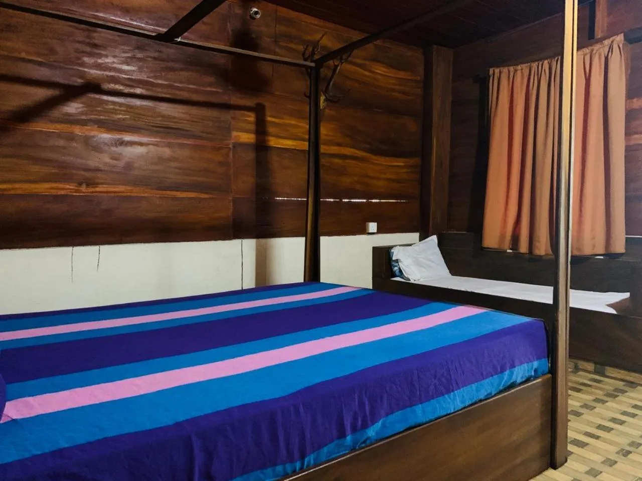 Bed in Shim Beach Resort