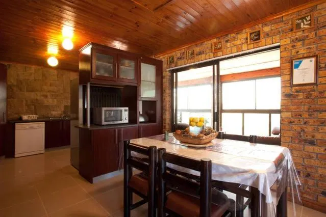 Communal kitchen in Quest Bed And Breakfast