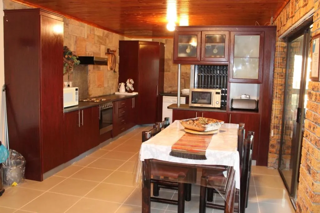 Communal kitchen in Quest Bed And Breakfast