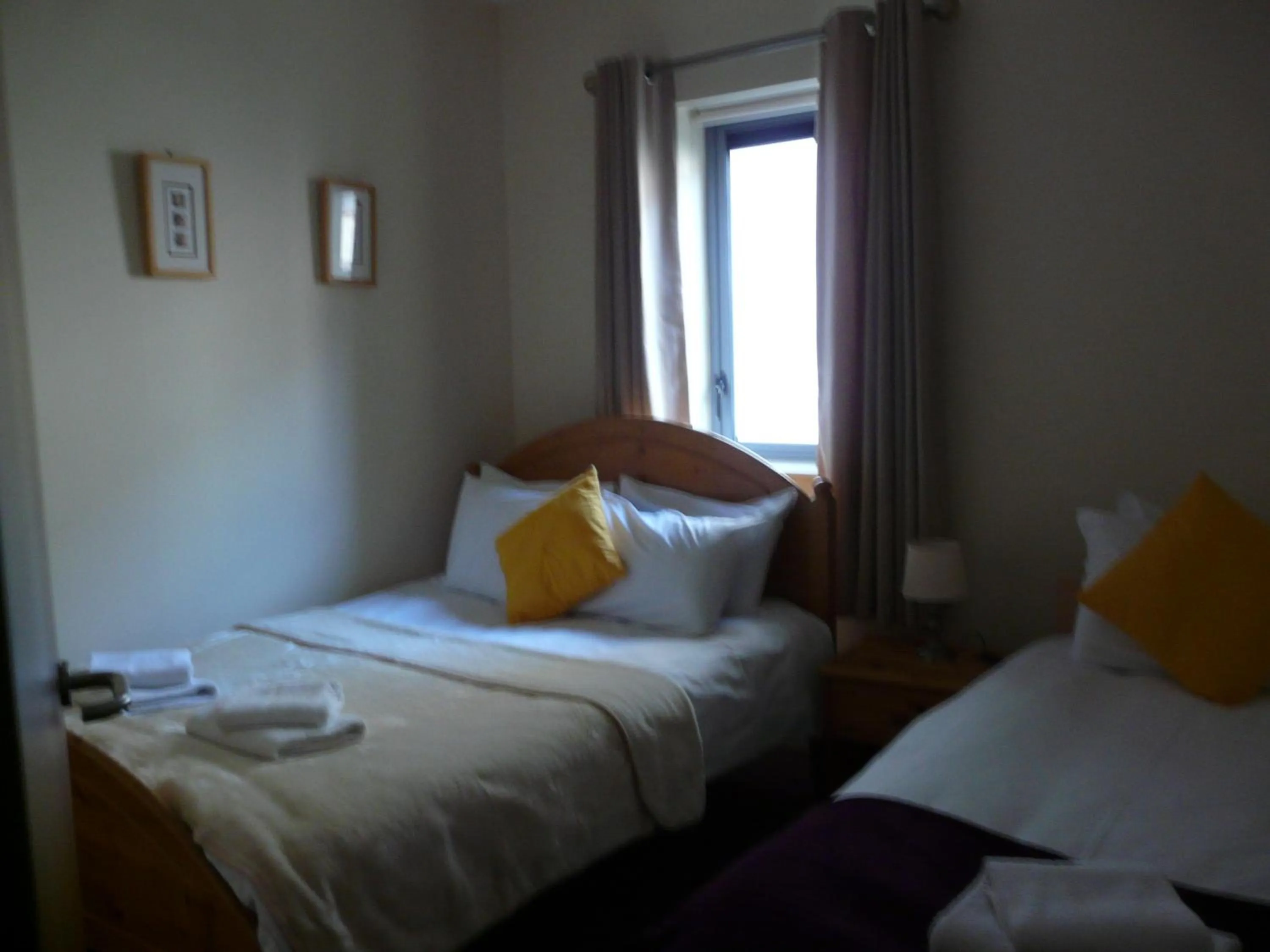 Bed in The Courtyard Apartments