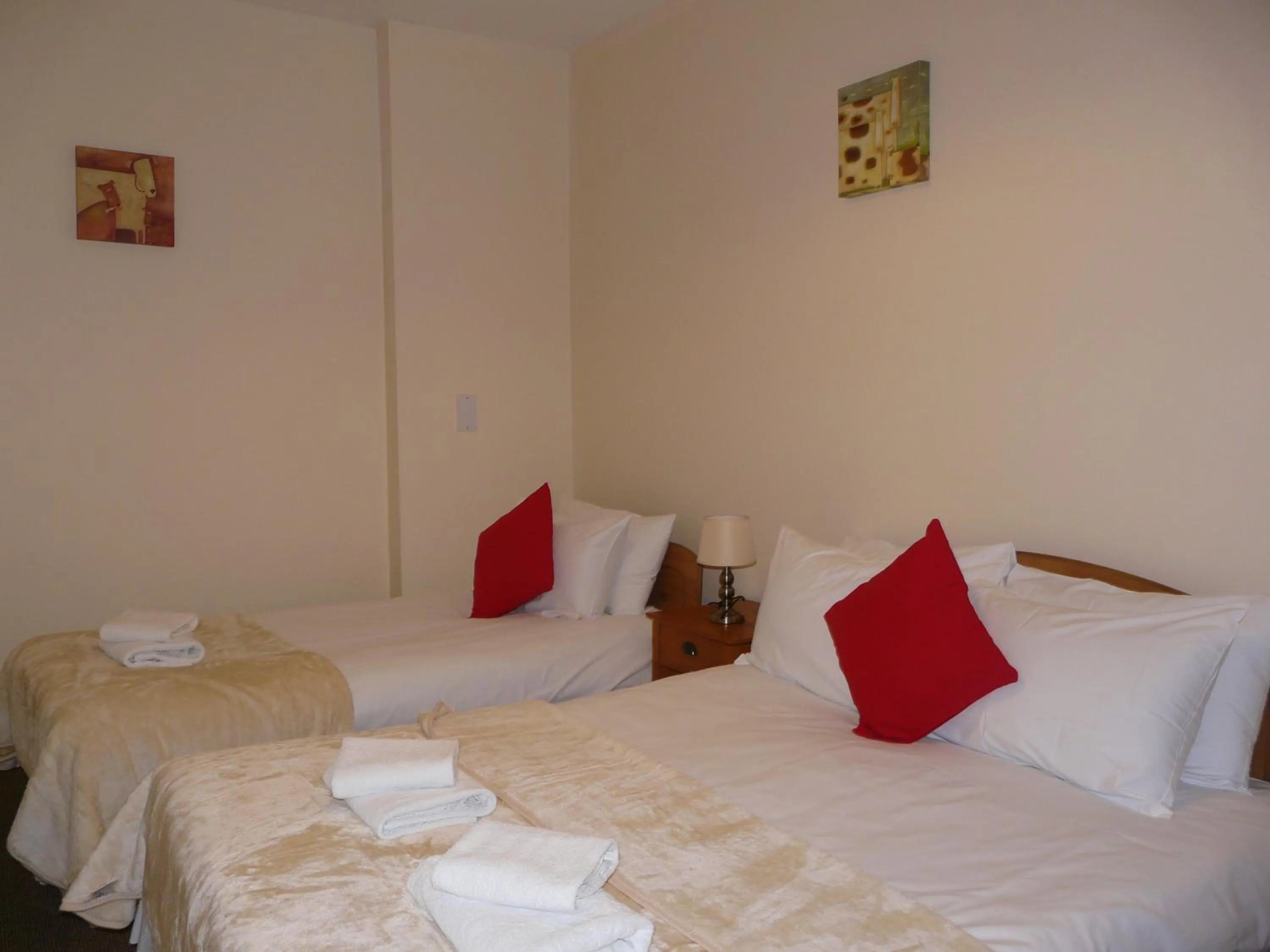 Bed in The Courtyard Apartments