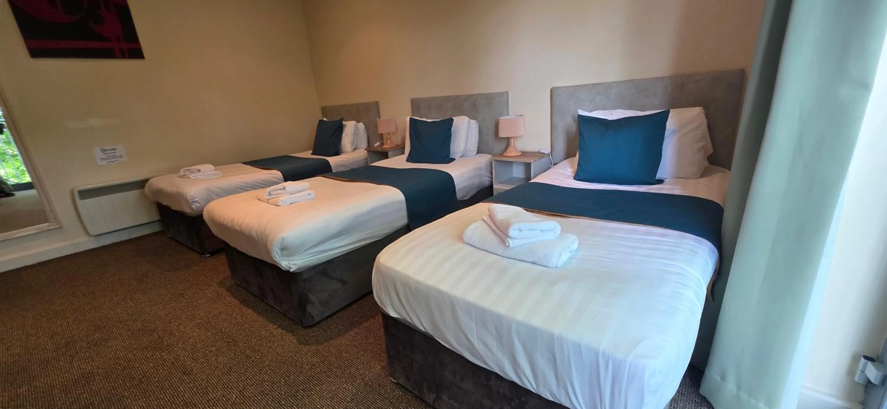 Bed in The Courtyard Apartments