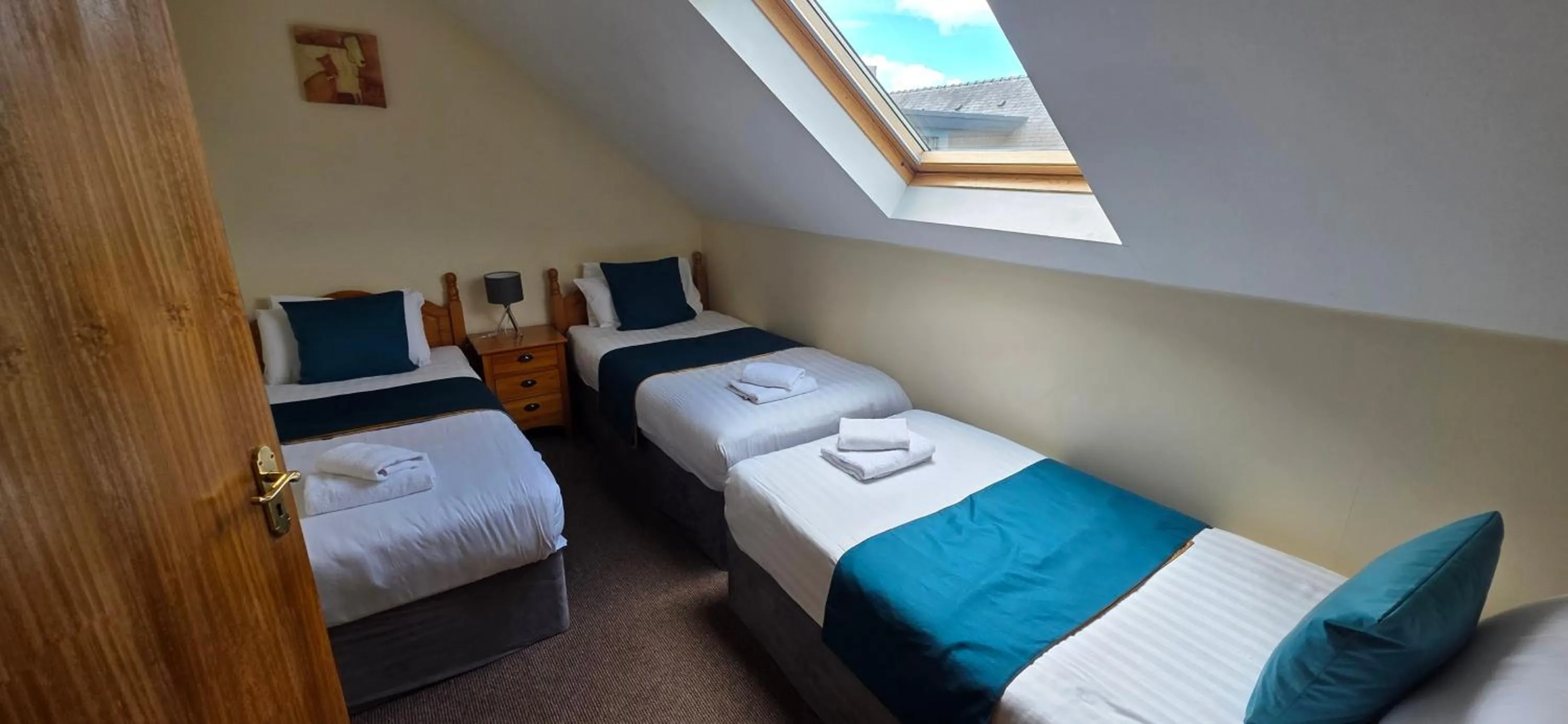 Bed in The Courtyard Apartments