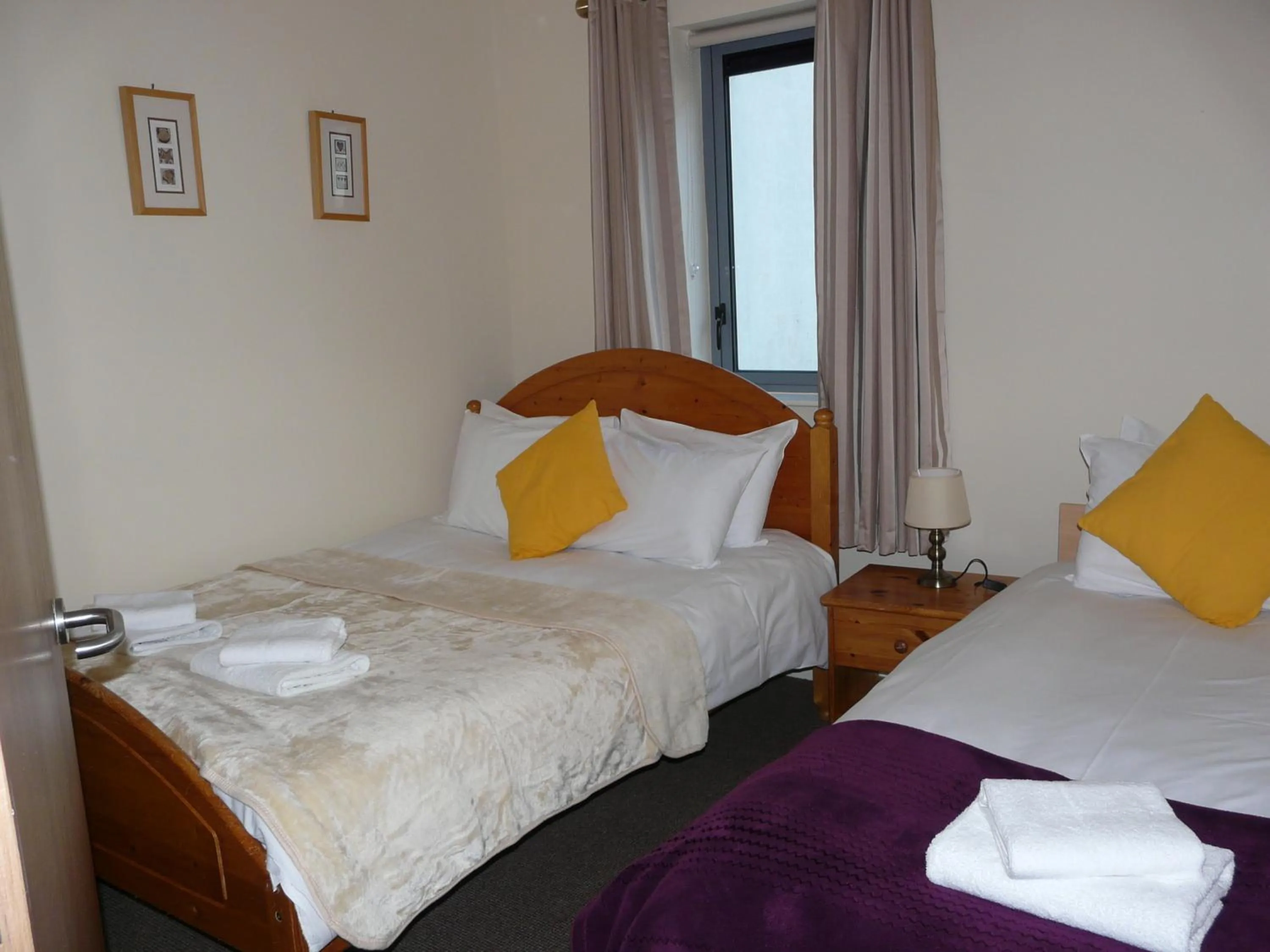 Bed in The Courtyard Apartments