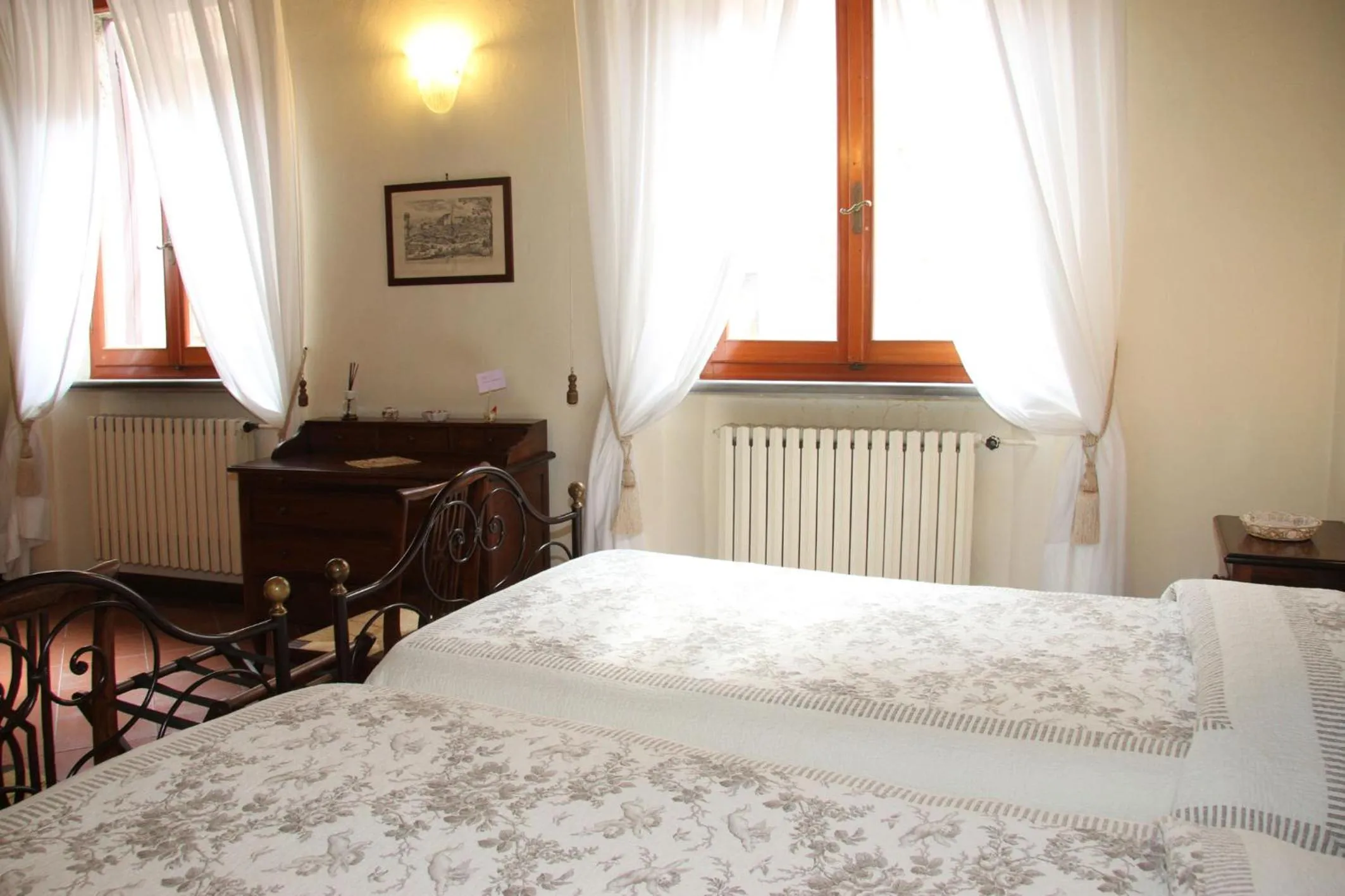 Bed in B&B L'Agnolo Di Caroti Cinzia
