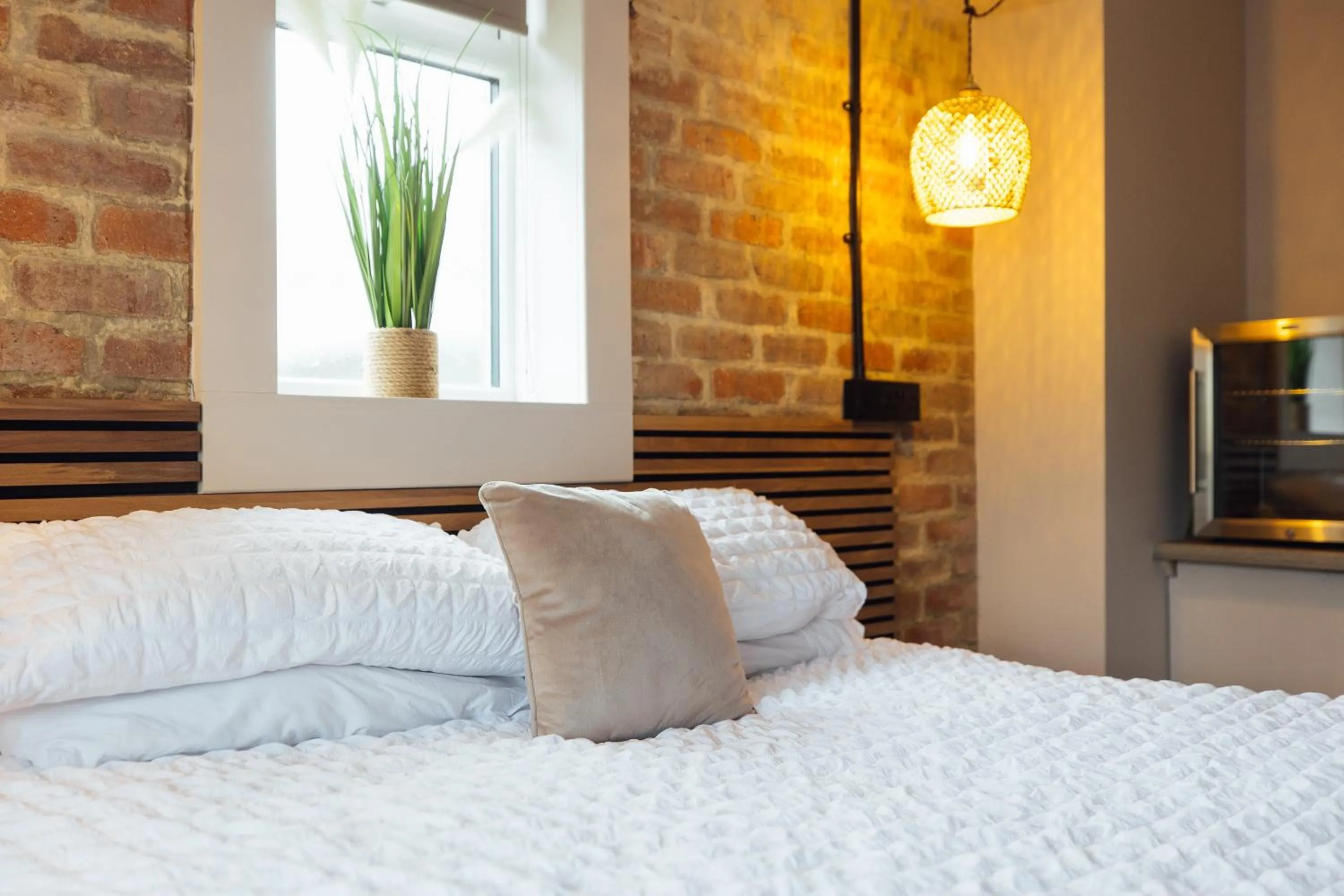 Bed in The Dolphin Hotel & Restaurant