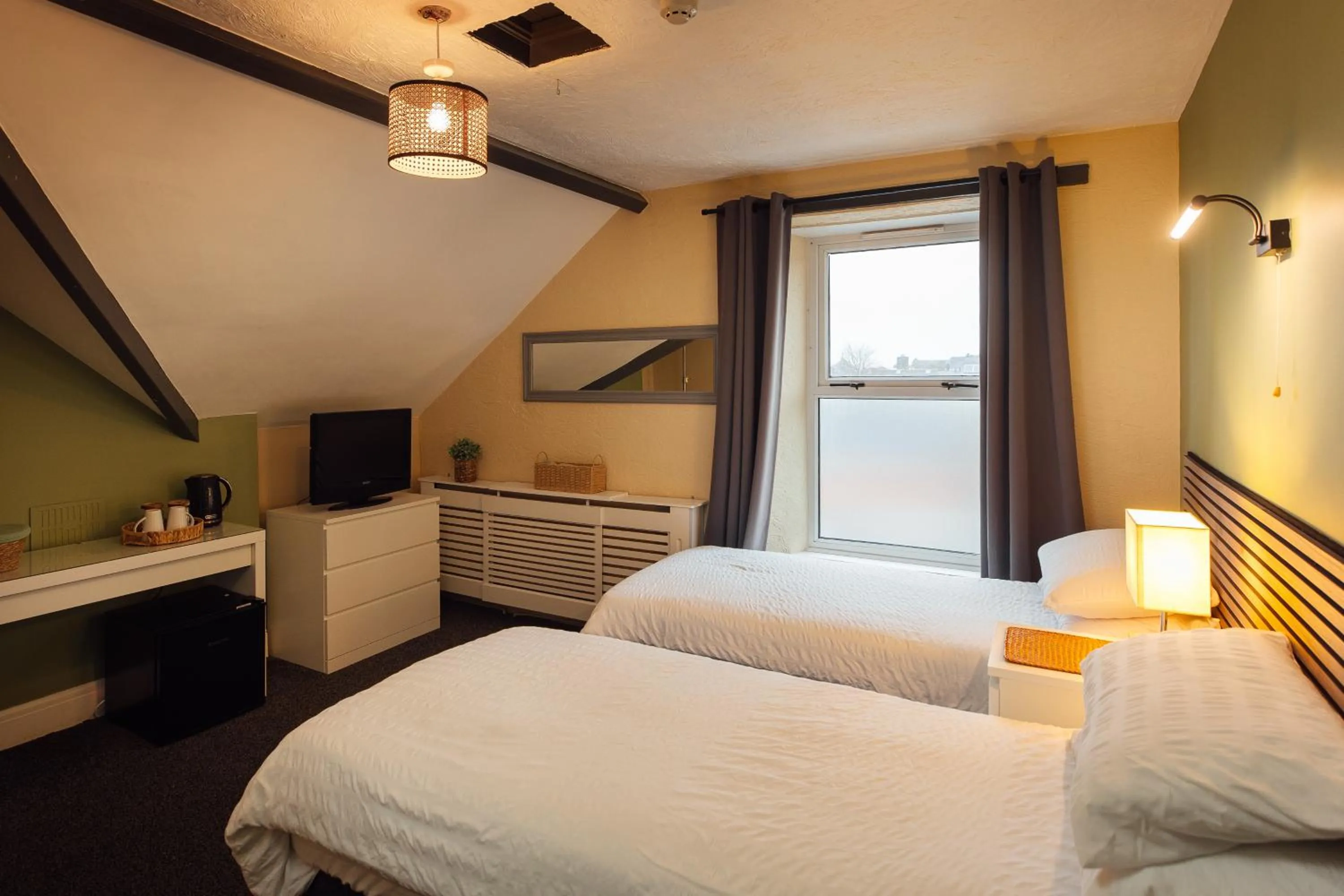 Bed in The Dolphin Hotel & Restaurant