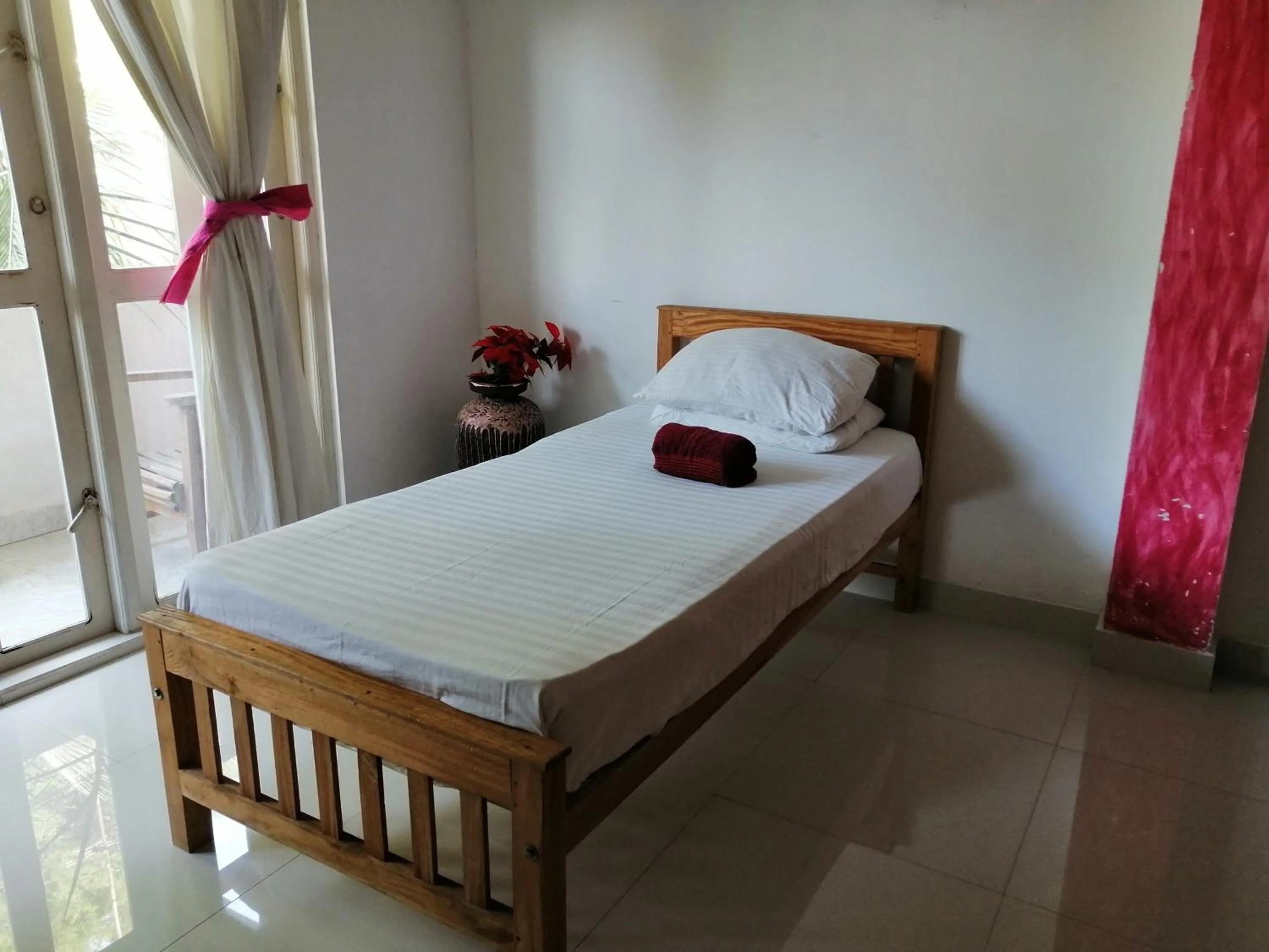 Bed in Sithila Villa