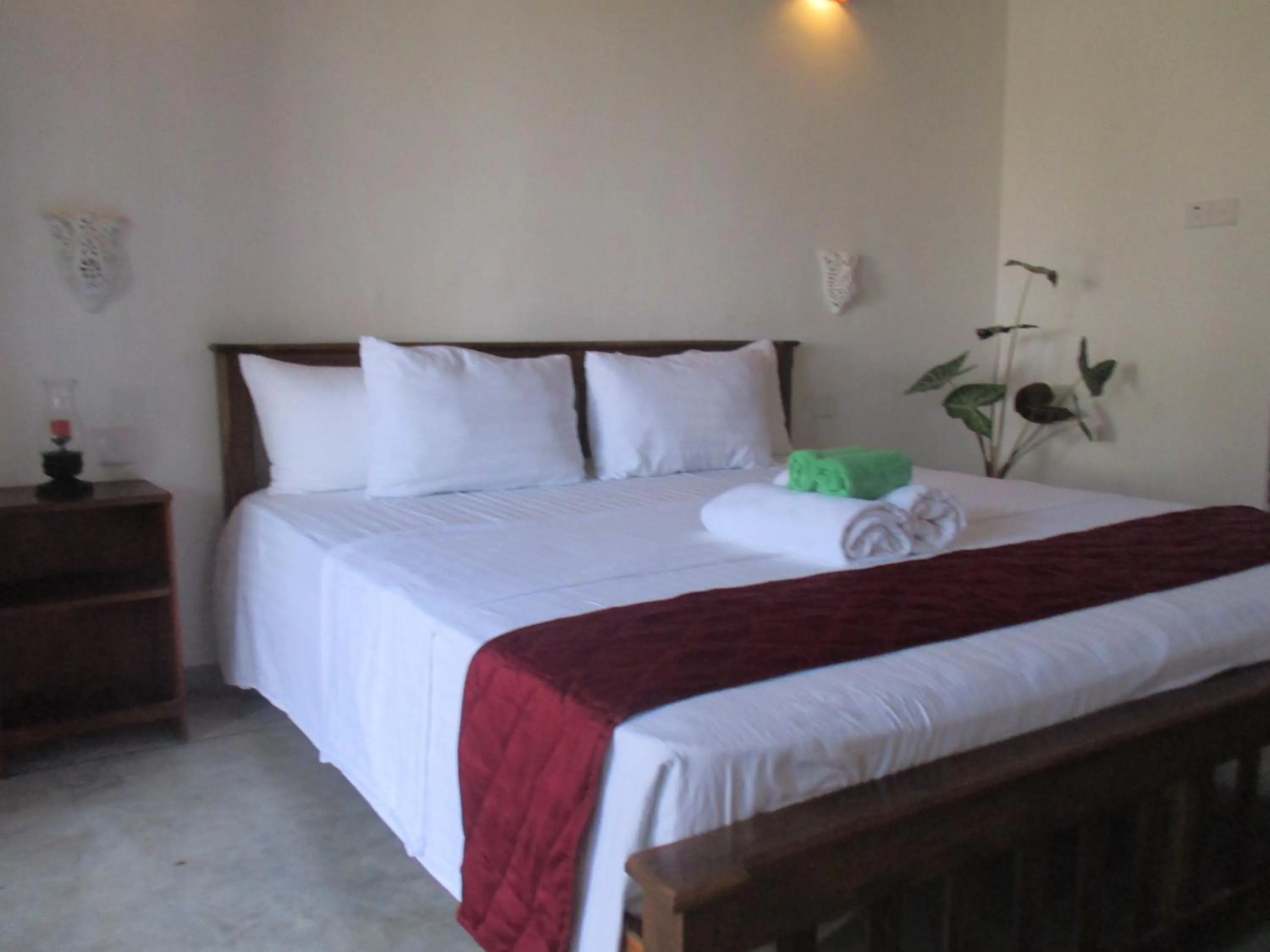 Bed in Sithila Villa