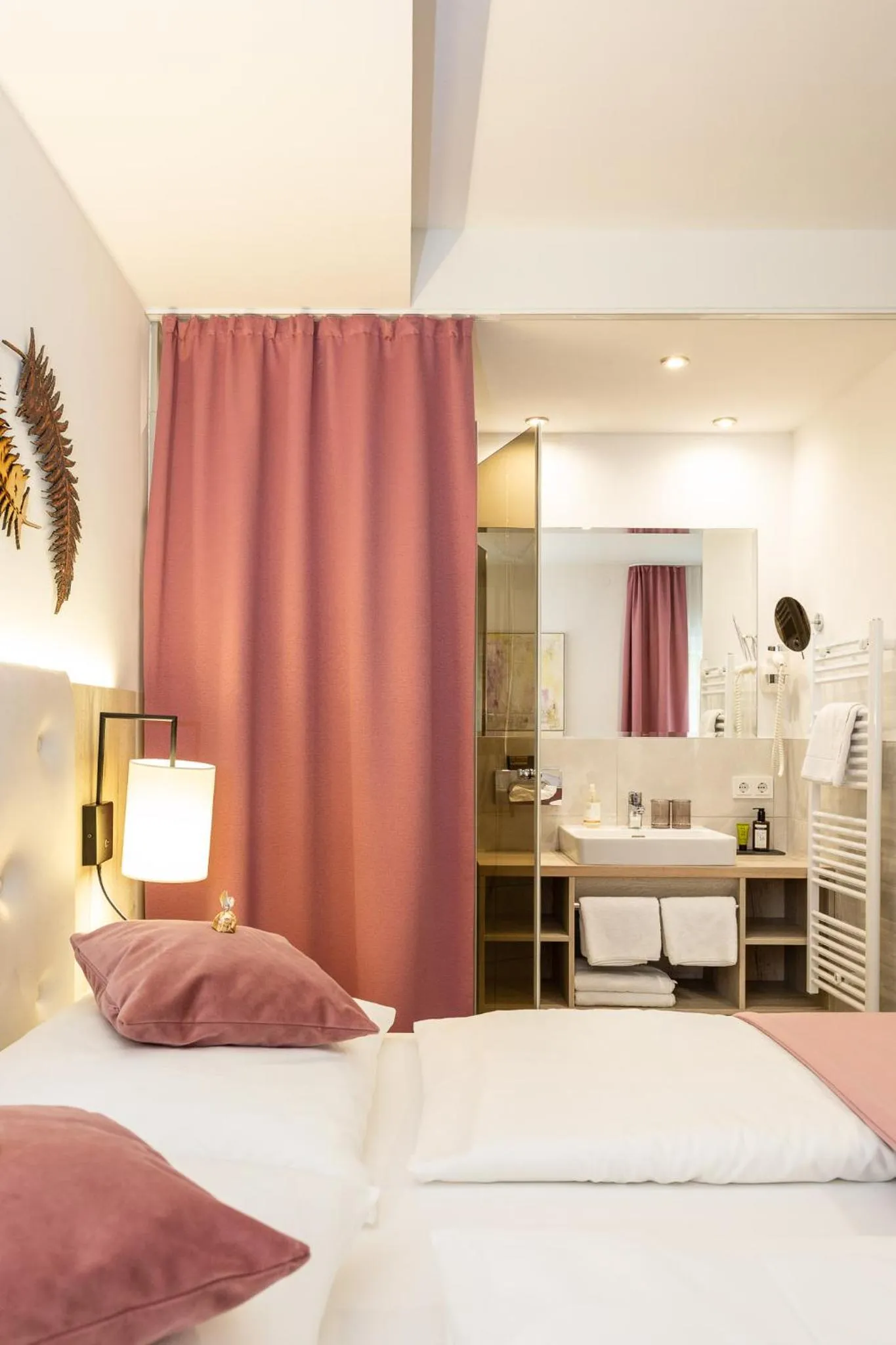 Photo of the whole room, Bed in Boutiquehotel Bergvilla