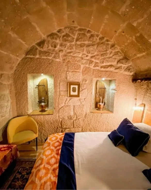 Bed in Elaa Cave Hotel