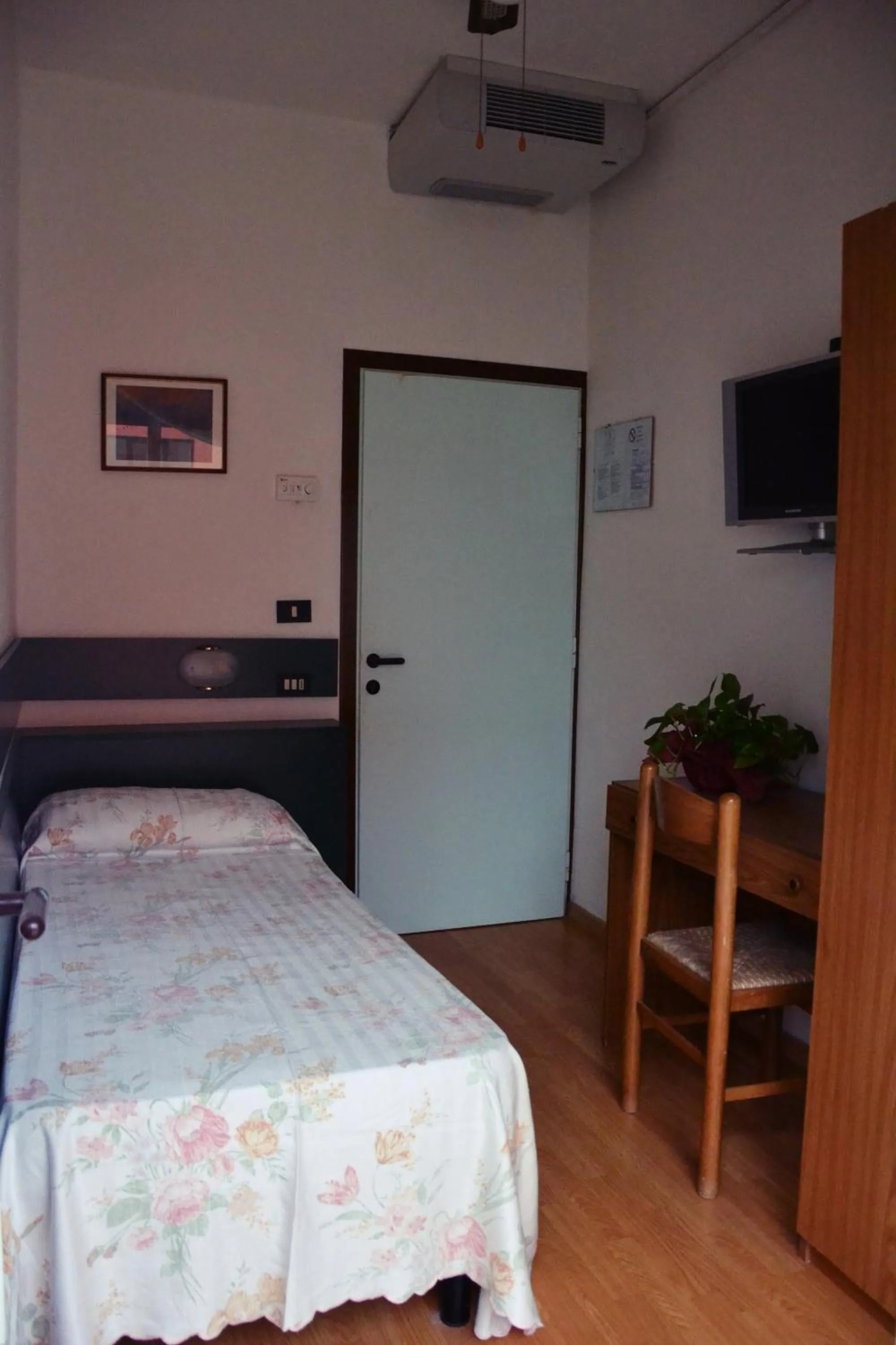 Bedroom in Hotel Rex