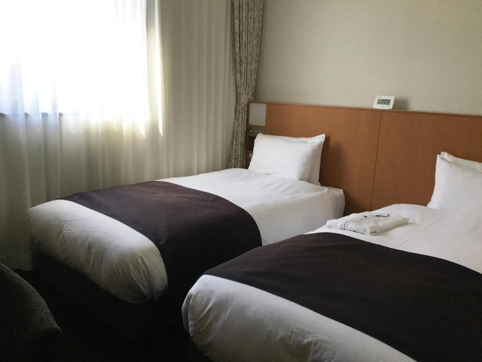 Bed in Hotel Folkloro Kakunodate