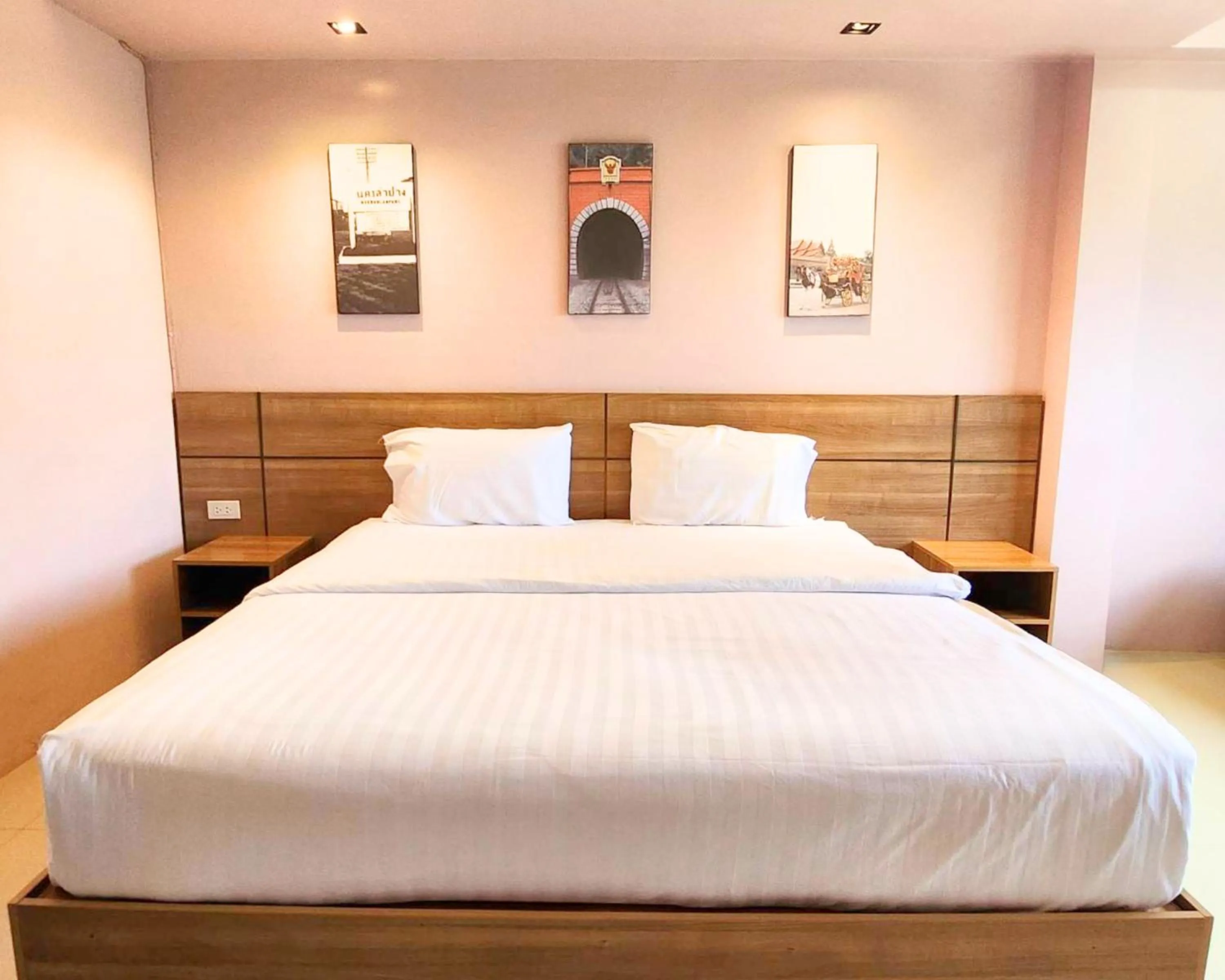 Bed in AIRBEST Gemtree Lampang Hotel