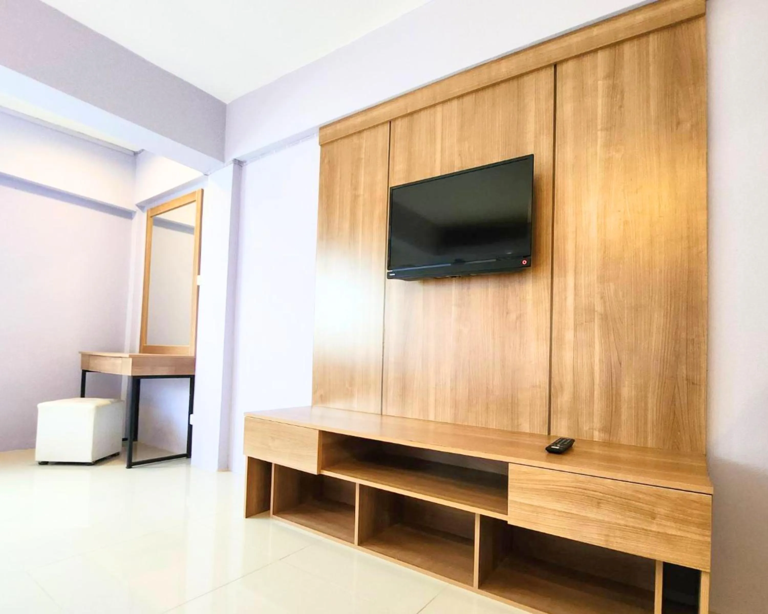 TV and multimedia in AIRBEST Gemtree Lampang Hotel