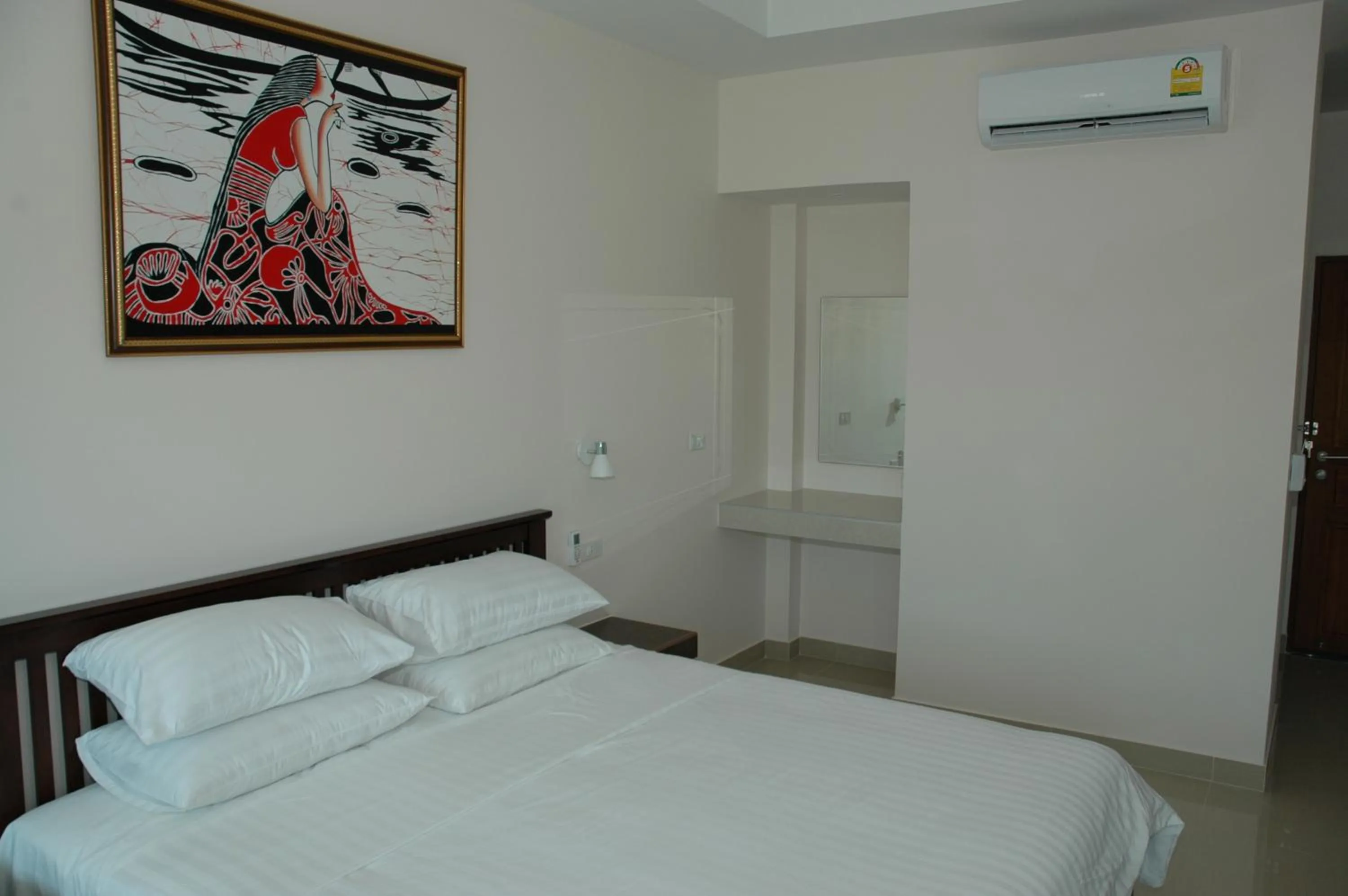 Bed in East Shore Pattaya Resort