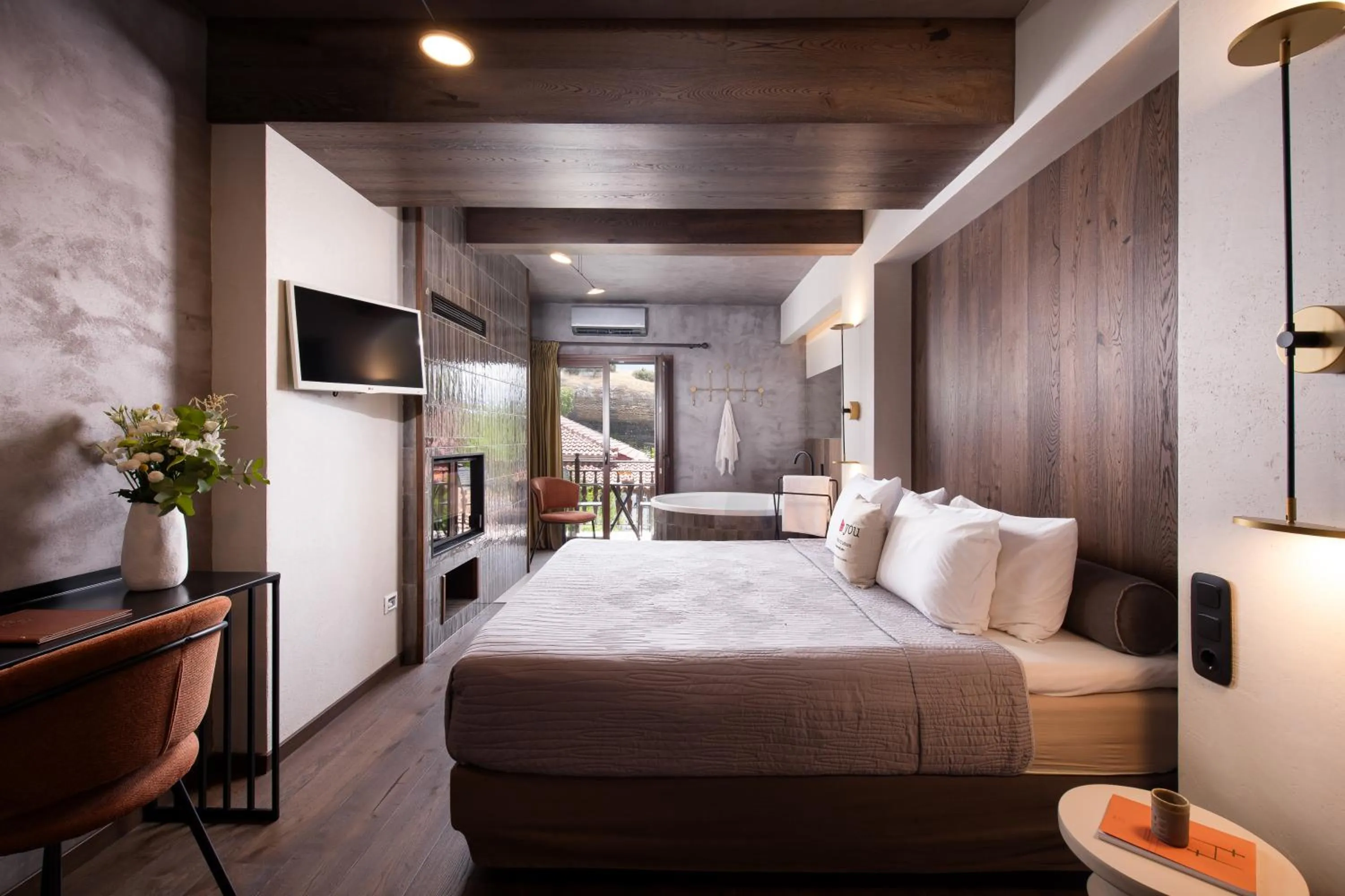 Bed in Tsikeli Boutique Hotel Meteora - Adults Friendly