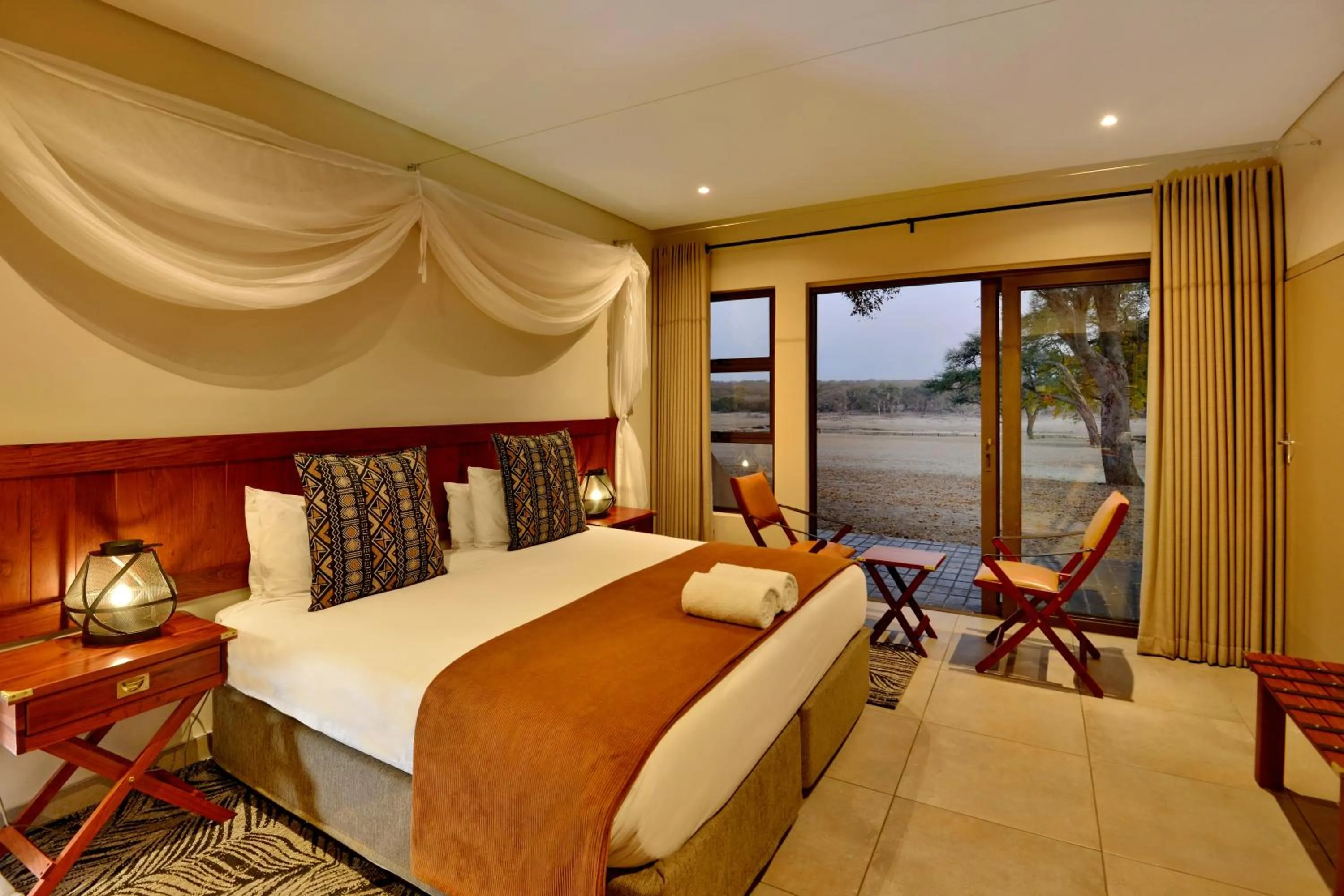 View (from property/room), Bed in Hwange Safari Lodge