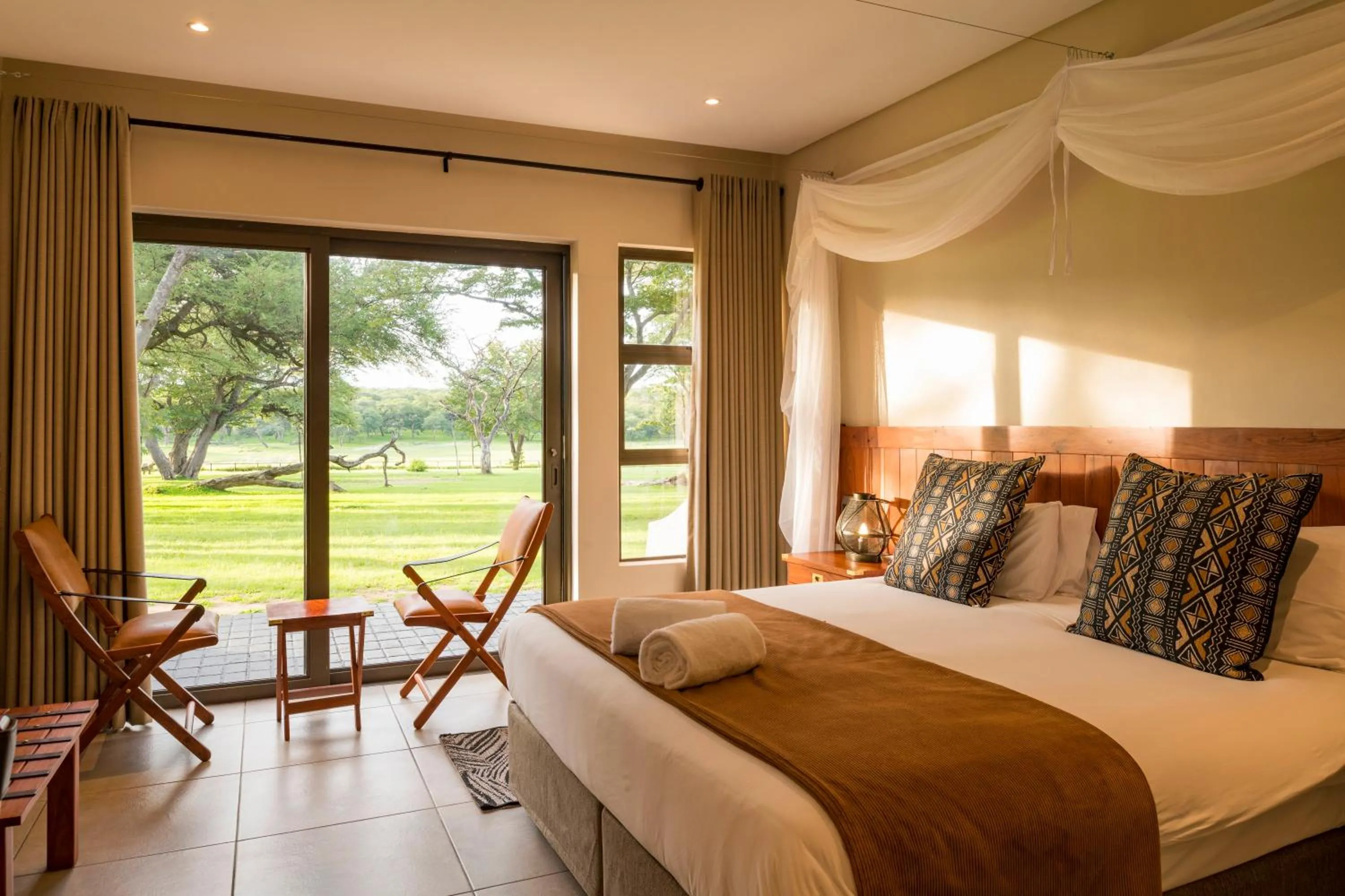 View (from property/room), Bed in Hwange Safari Lodge