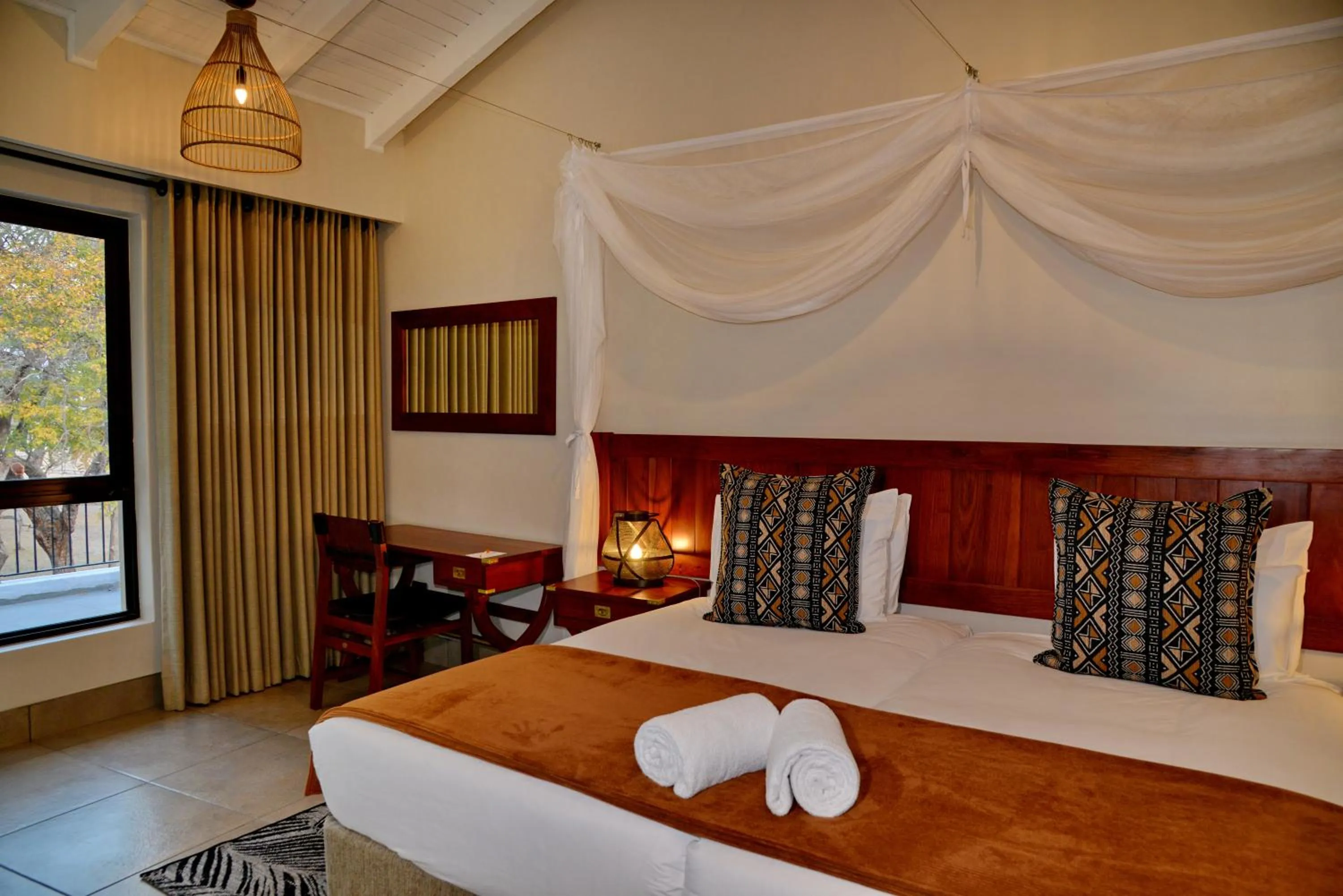 Bed in Hwange Safari Lodge